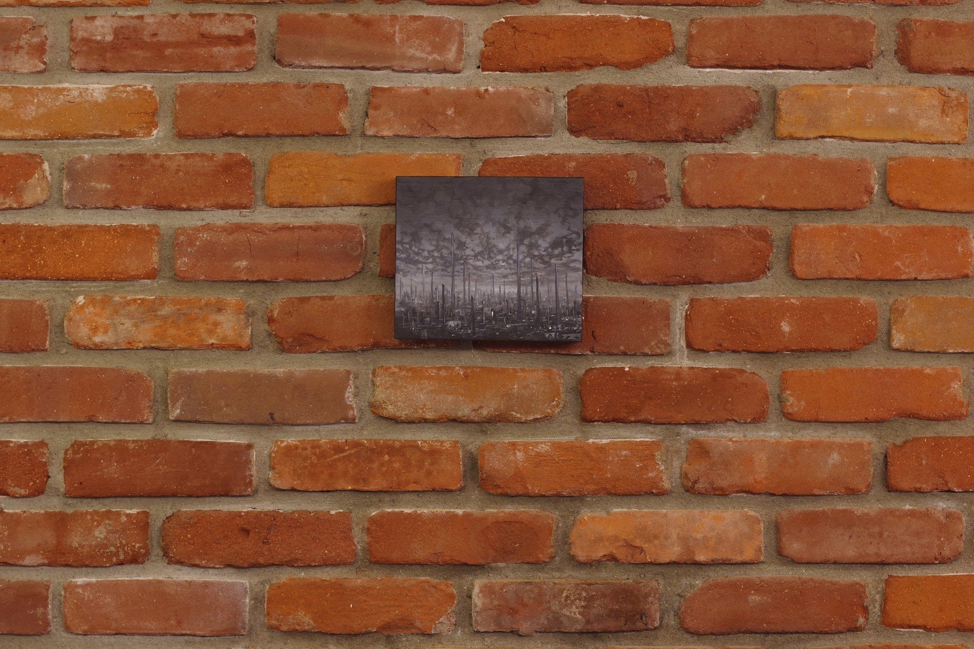 A monochromatic painting of a desolate landscape filled with dark, vertical tree trunks.