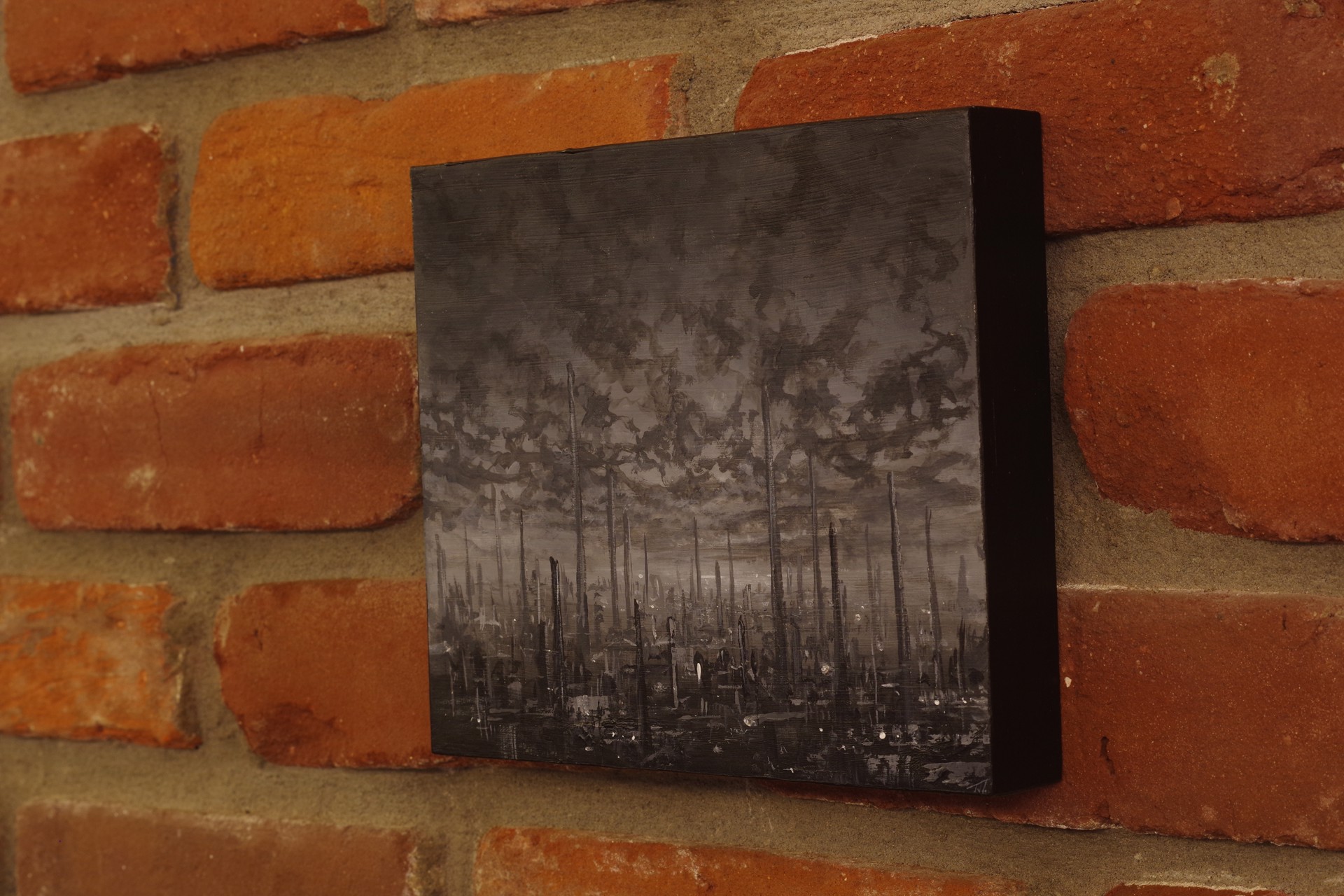 A monochromatic painting of a desolate landscape filled with dark, vertical tree trunks.