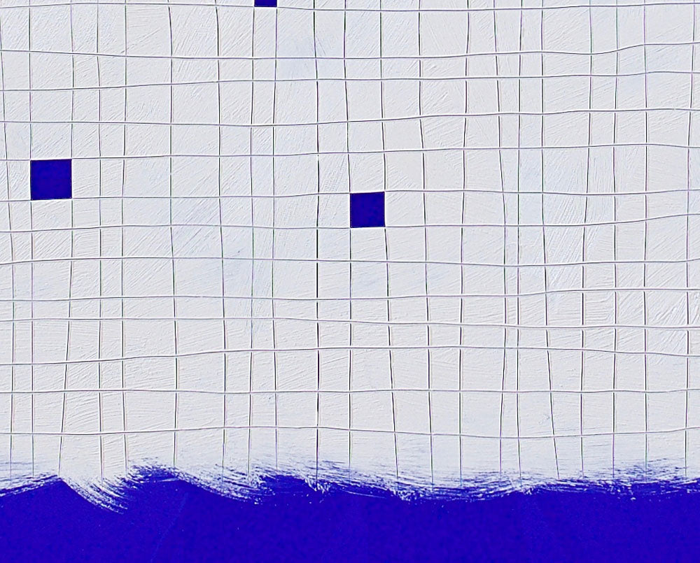 A piece of paper with blue squares on it.