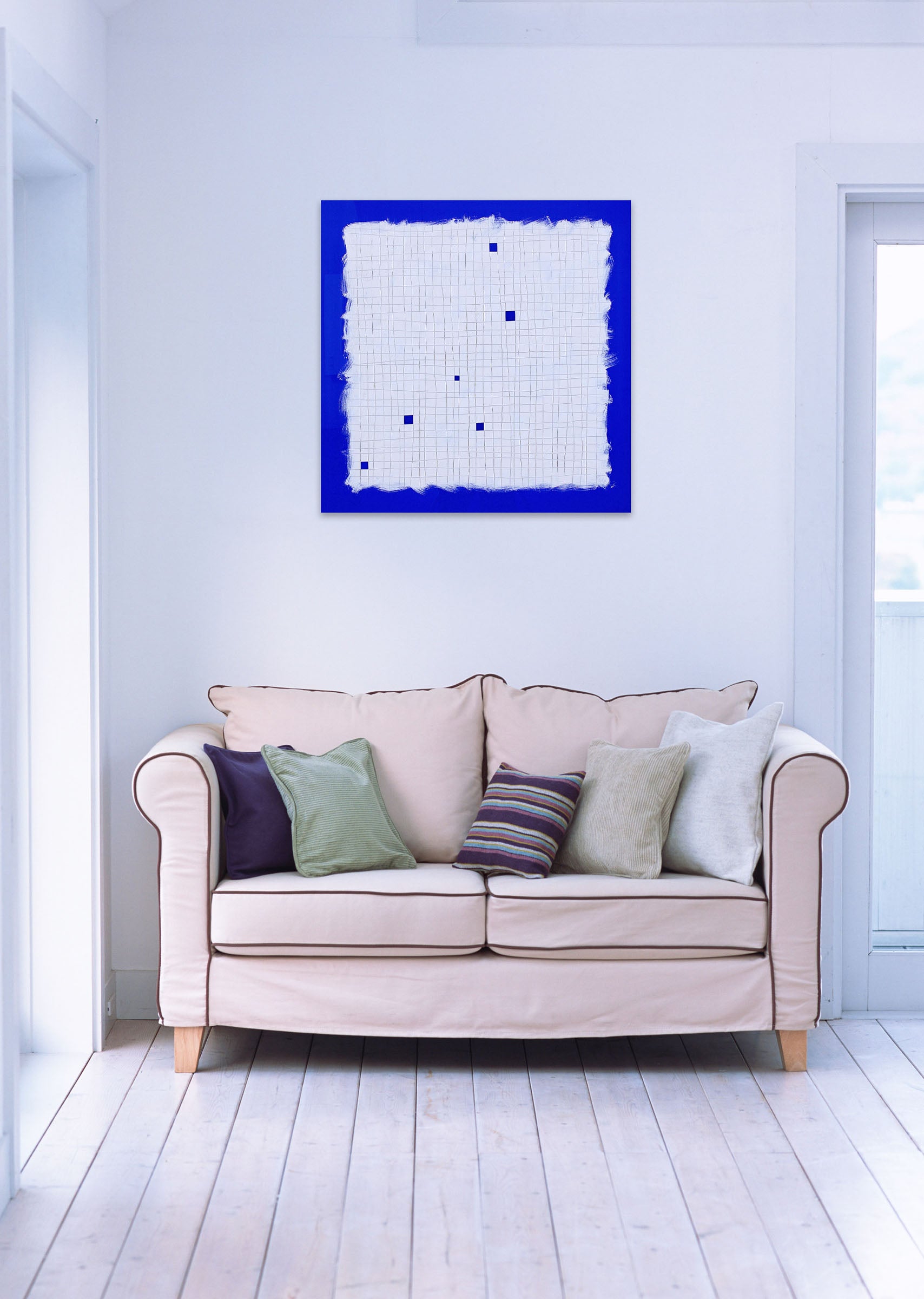 A piece of paper with blue squares on it.