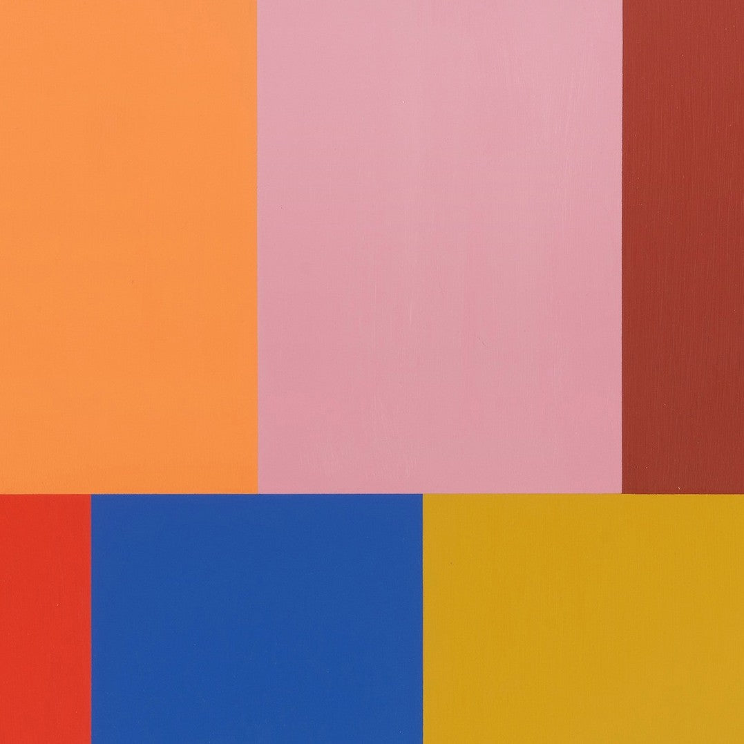 A picture of a colorful painting on a white wall.