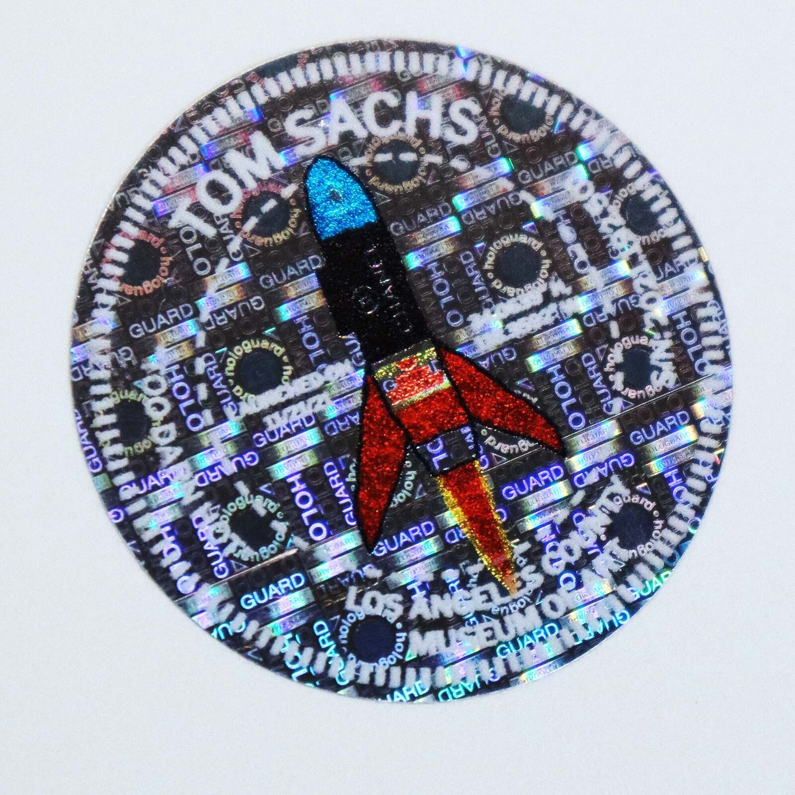 A drawing of a rocket with a chanel logo on it.