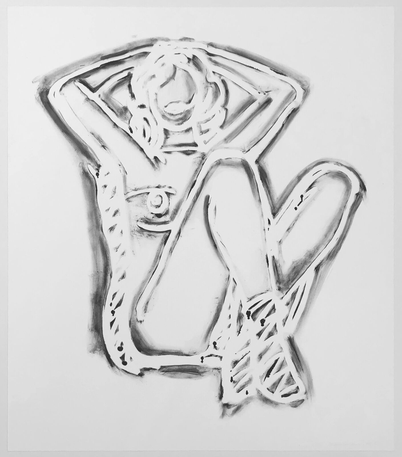 A drawing of a woman sitting on the ground.