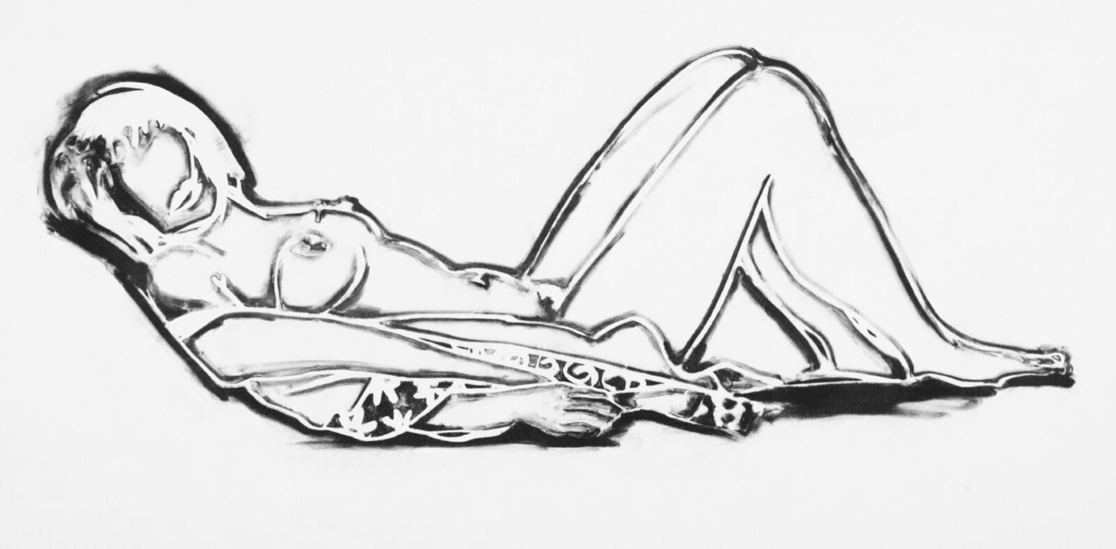 A drawing of a woman laying down on the ground.
