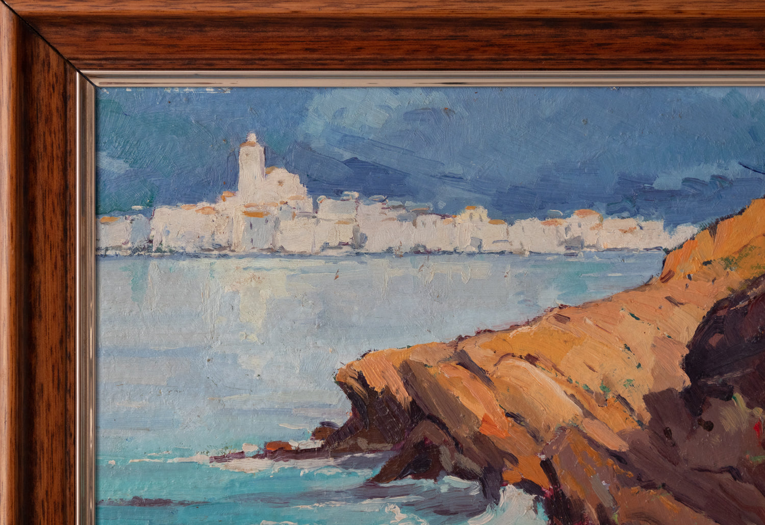 A painting of a rocky coastline with a lighthouse in the distance.