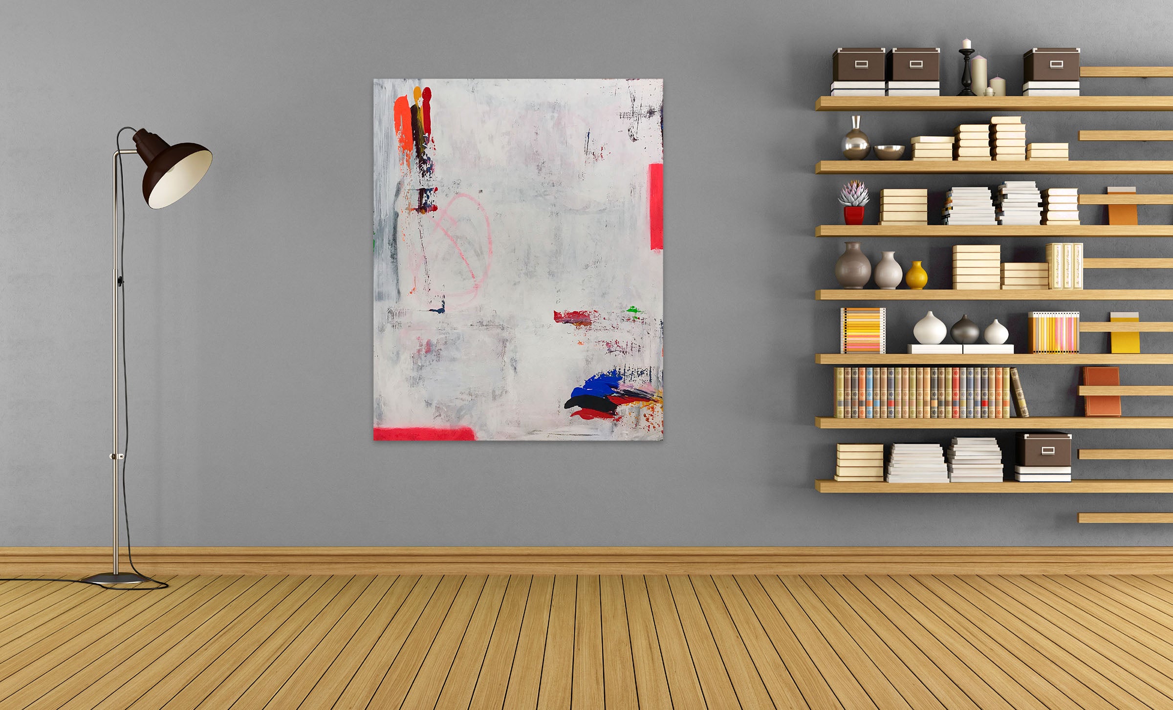 A painting on a white wall with red, blue, and yellow paint.