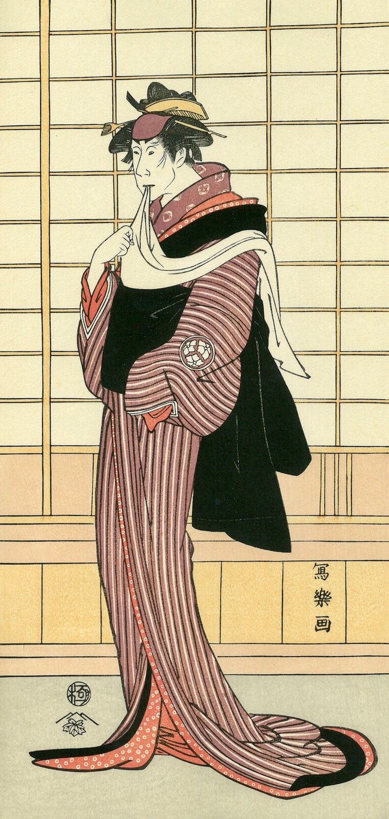 A woman in a kimono smoking a cigarette. 