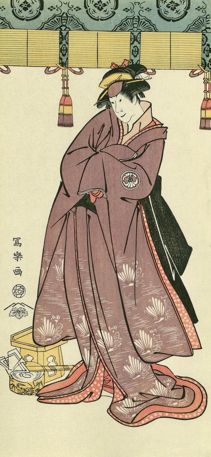 A woman in a kimono standing in front of a window.