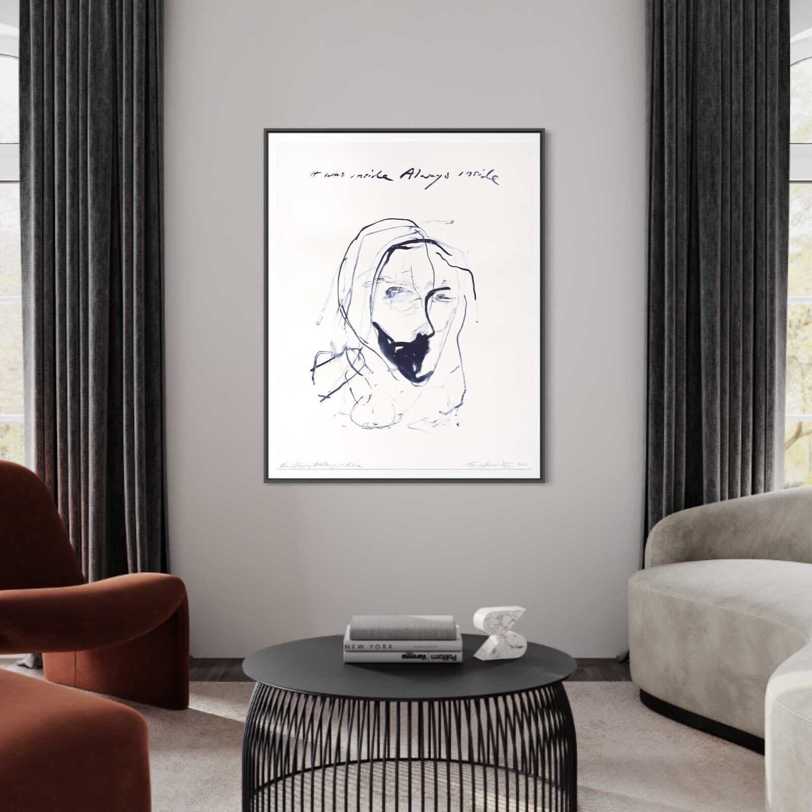 A black and white drawing of a woman's face on a wall.