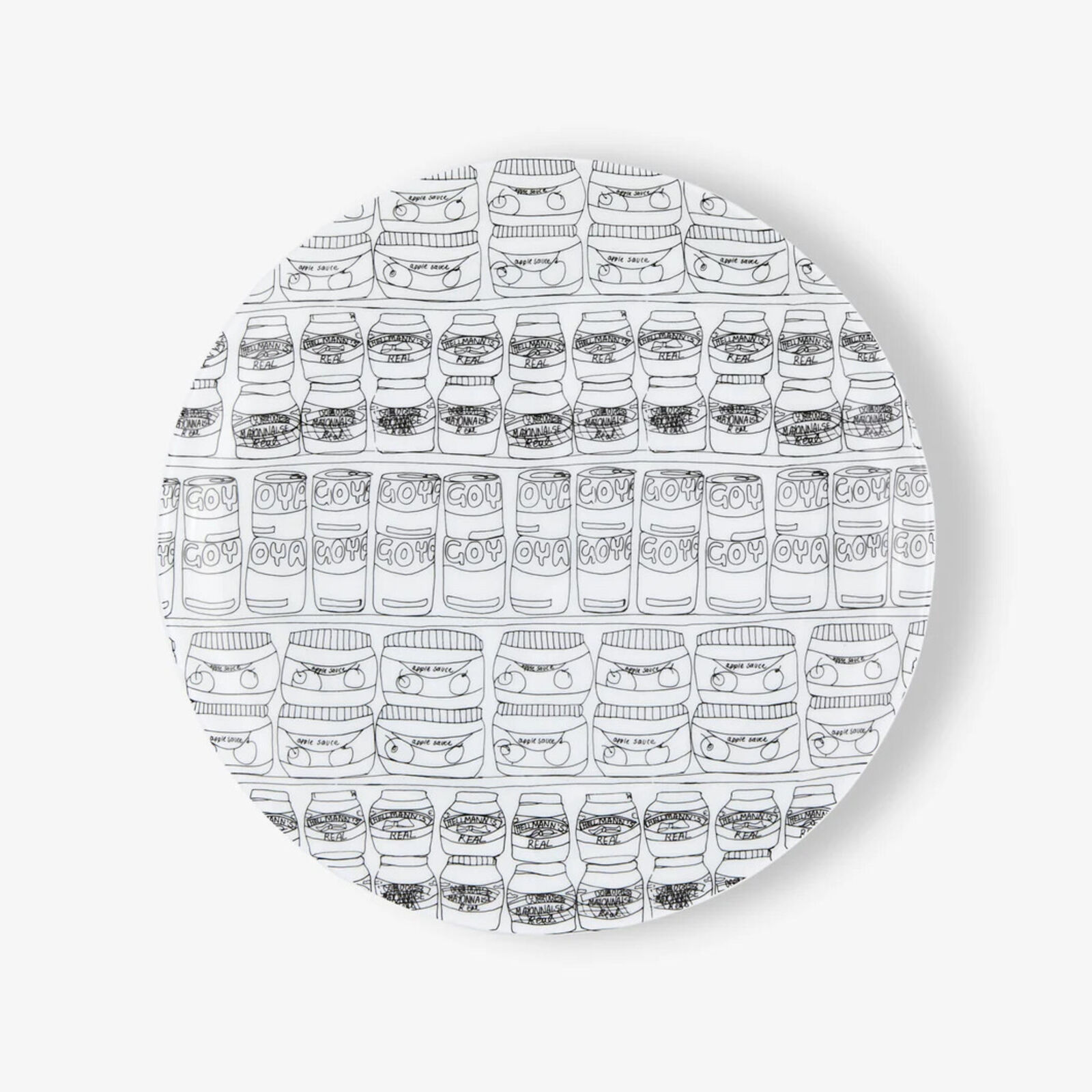 a white plate with a black and white pattern on it
