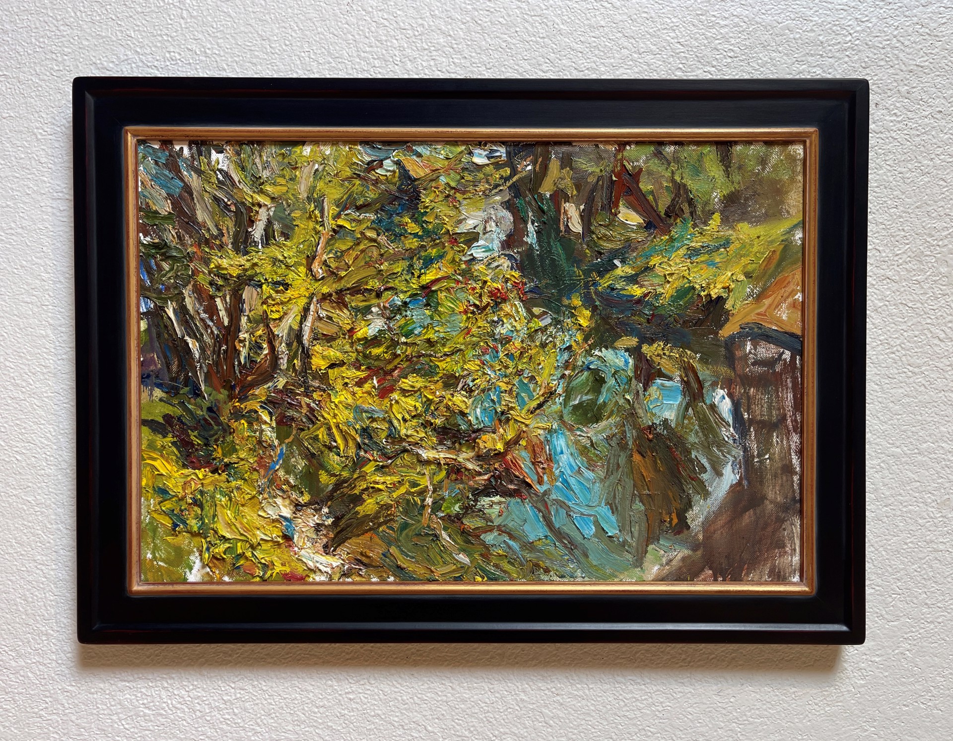A thickly painted landscape featuring a vibrant, textured tree with bold strokes of yellow and green.