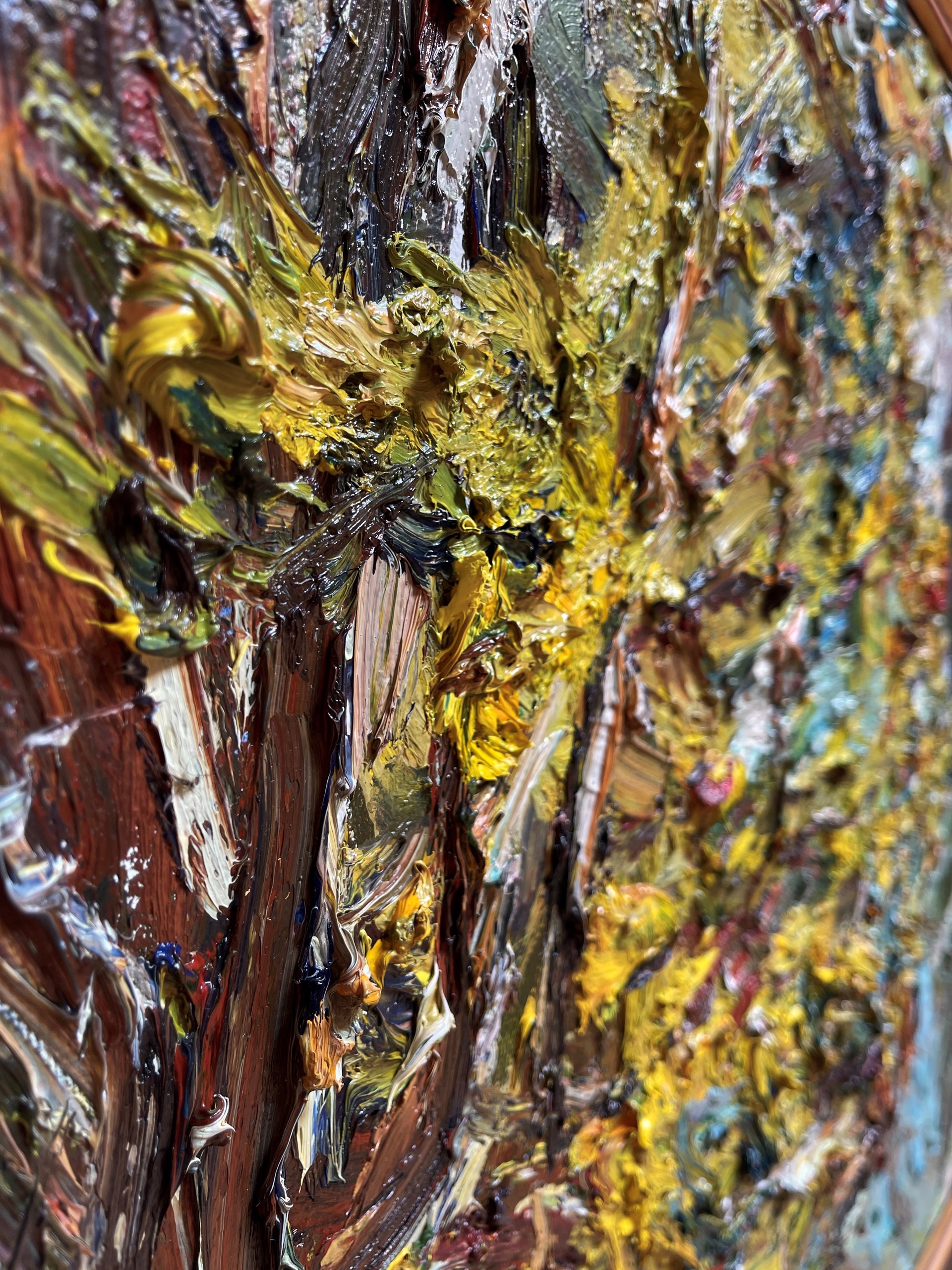 A thickly painted landscape featuring a vibrant, textured tree with bold strokes of yellow and green.