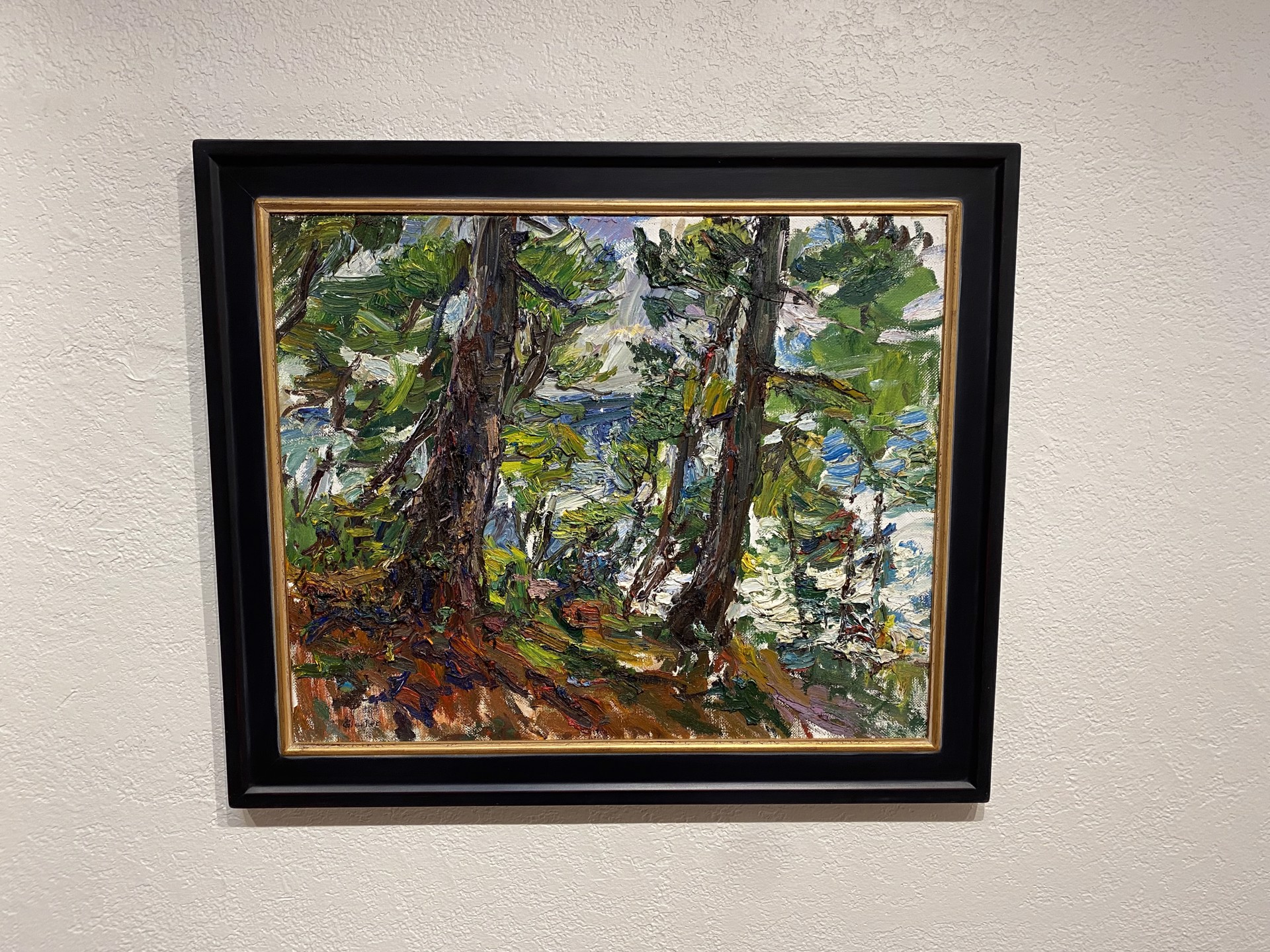 A painting of trees in a wooded area with snow on the ground.