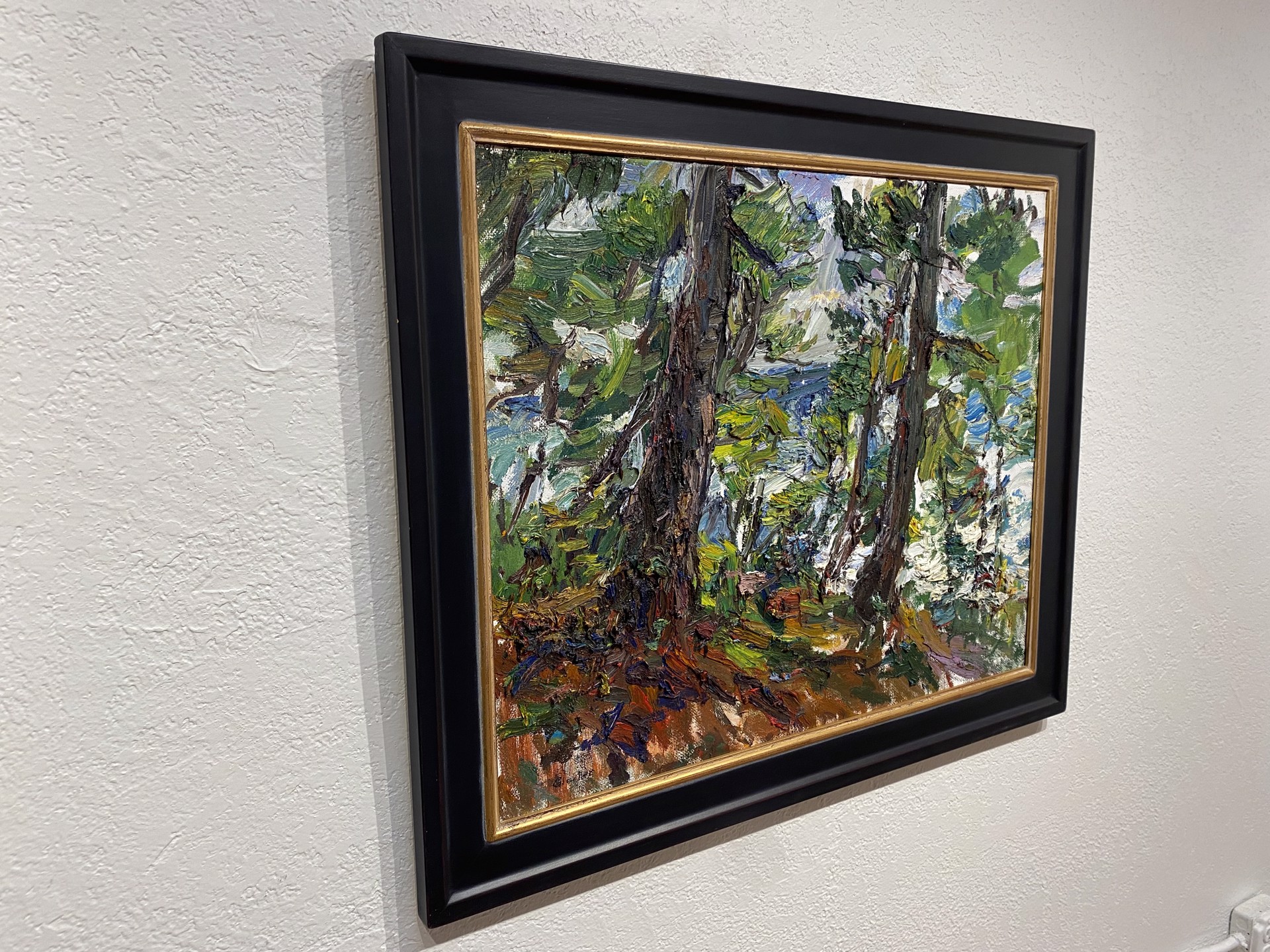 A painting of trees in a wooded area with snow on the ground.