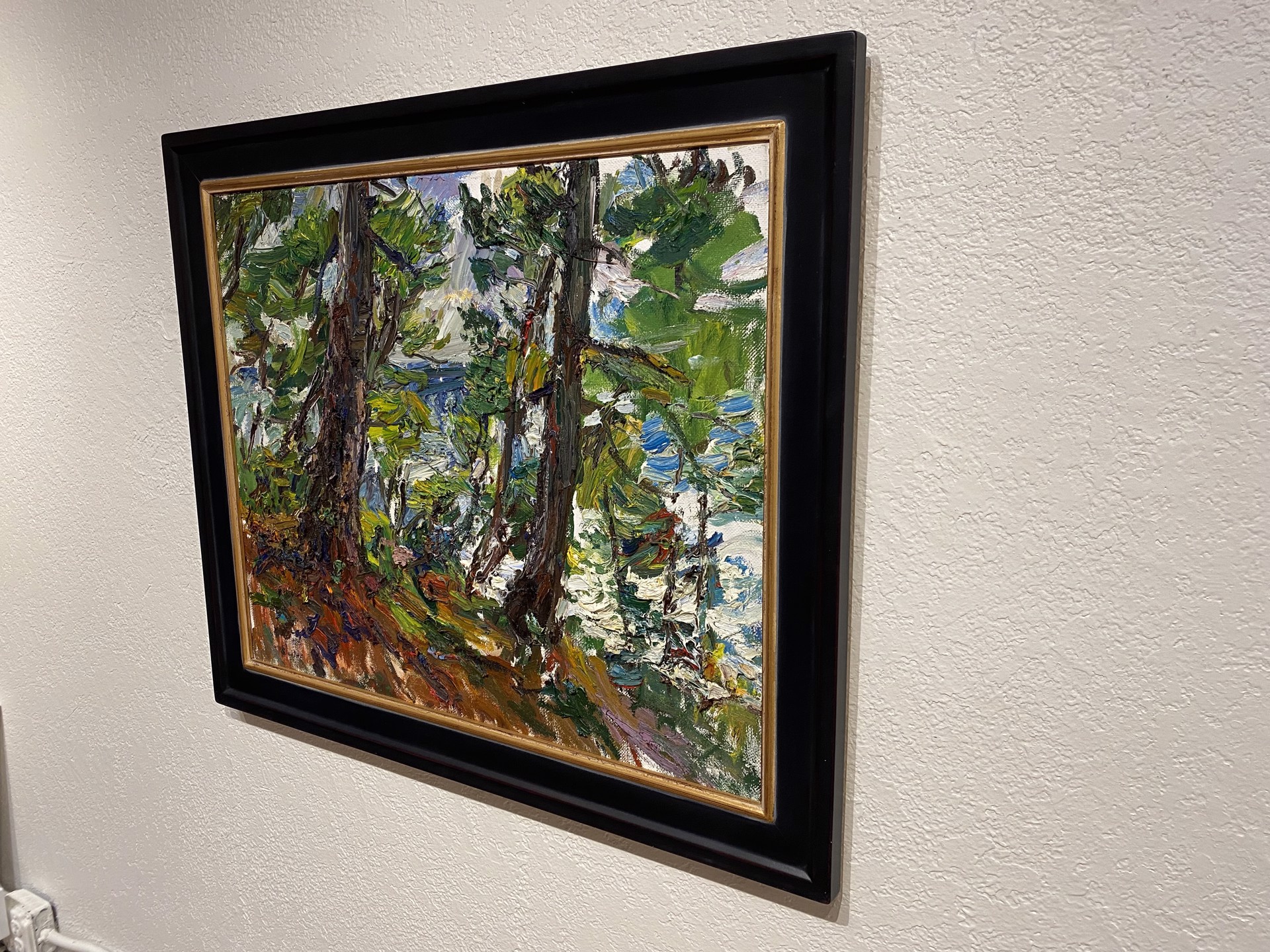 A painting of trees in a wooded area with snow on the ground.