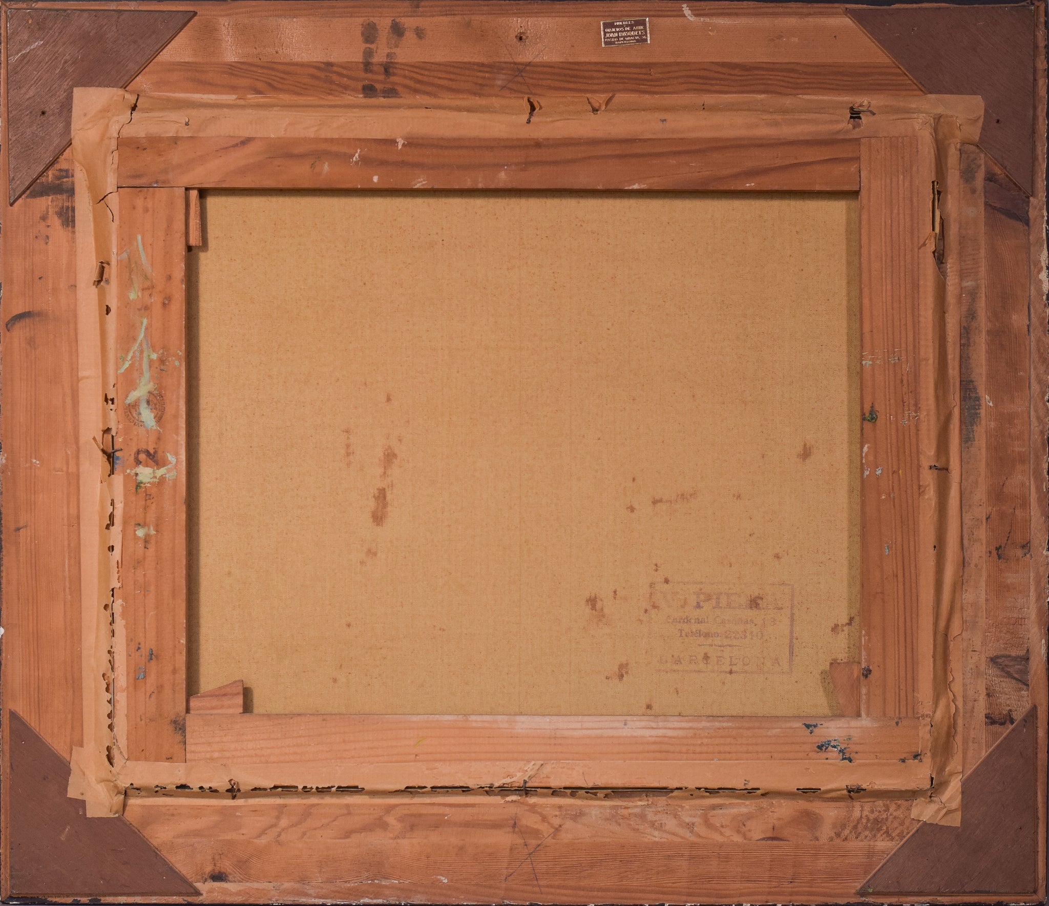 A painting of a rocky shoreline with a body of water.