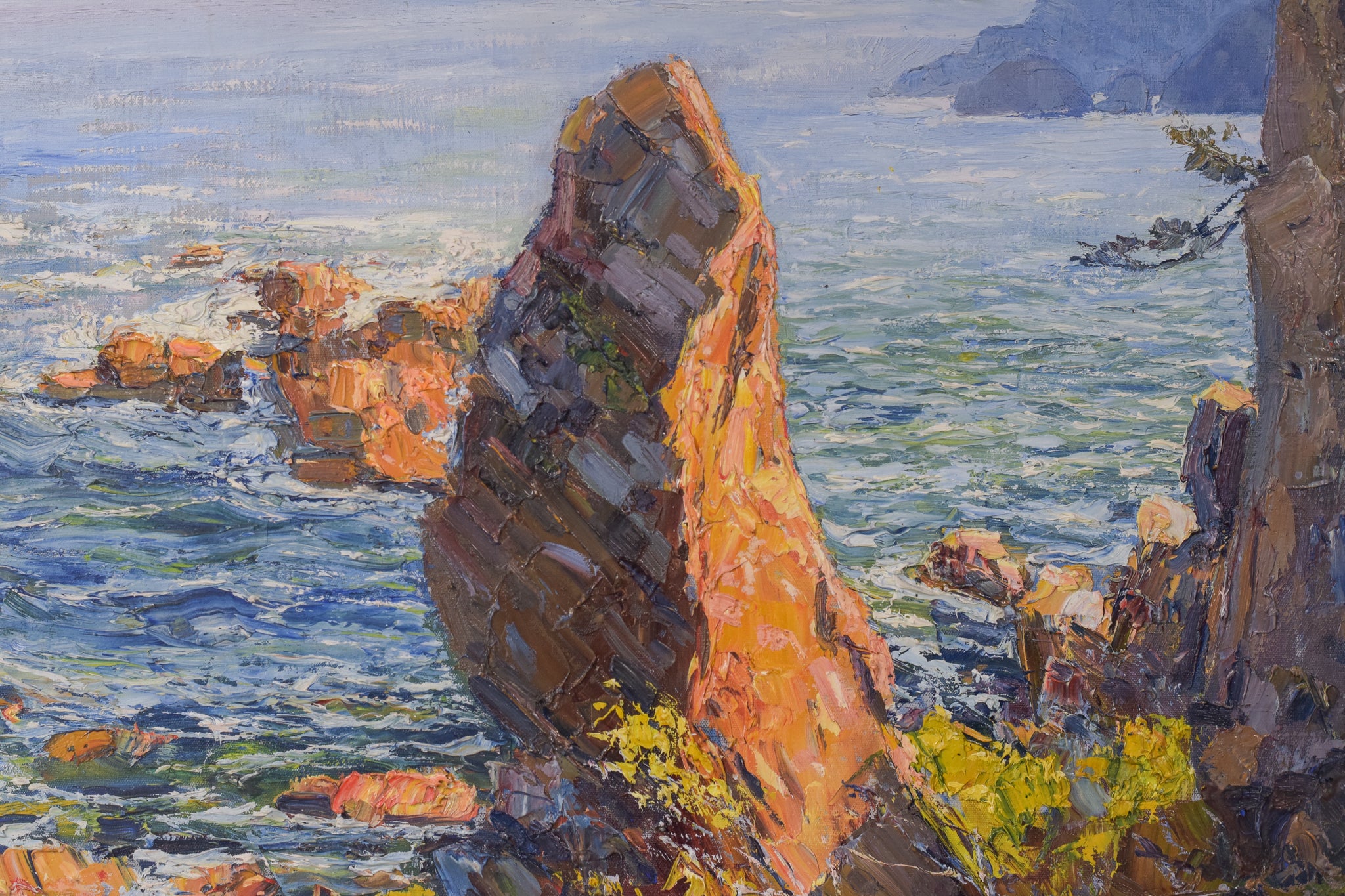 A painting of a rocky shoreline with a body of water.