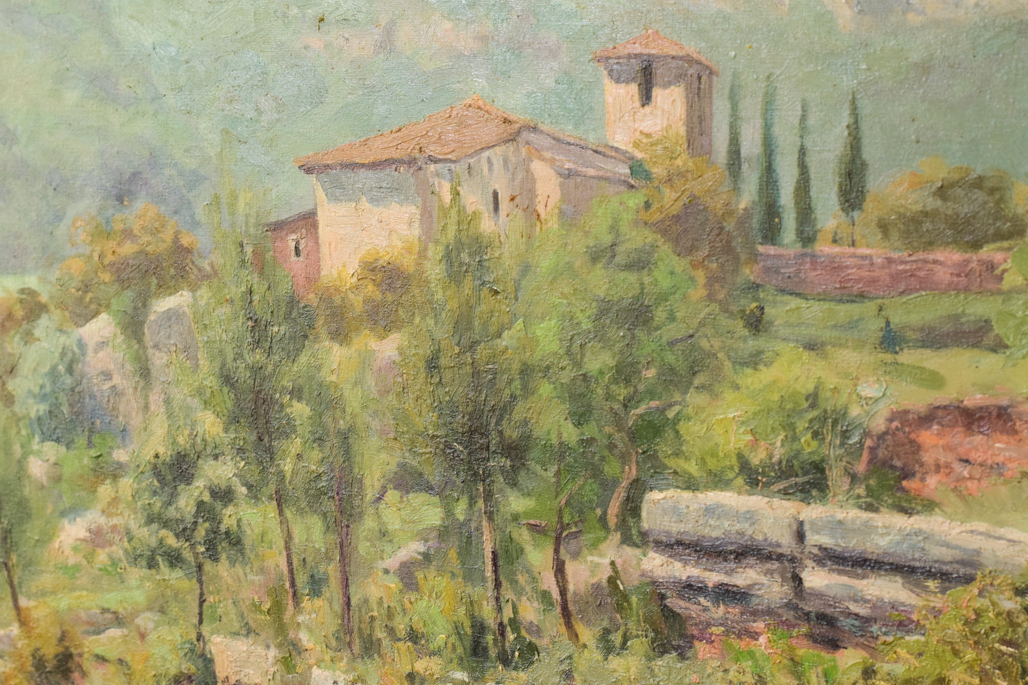 A painting of a landscape with a house on a hill.