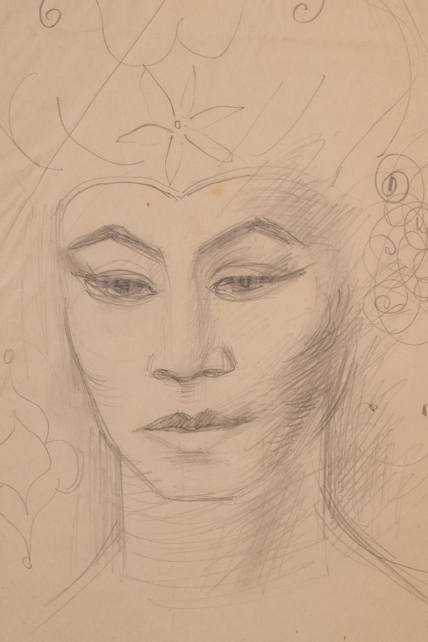 A drawing of a woman's face with a flower in her hair.