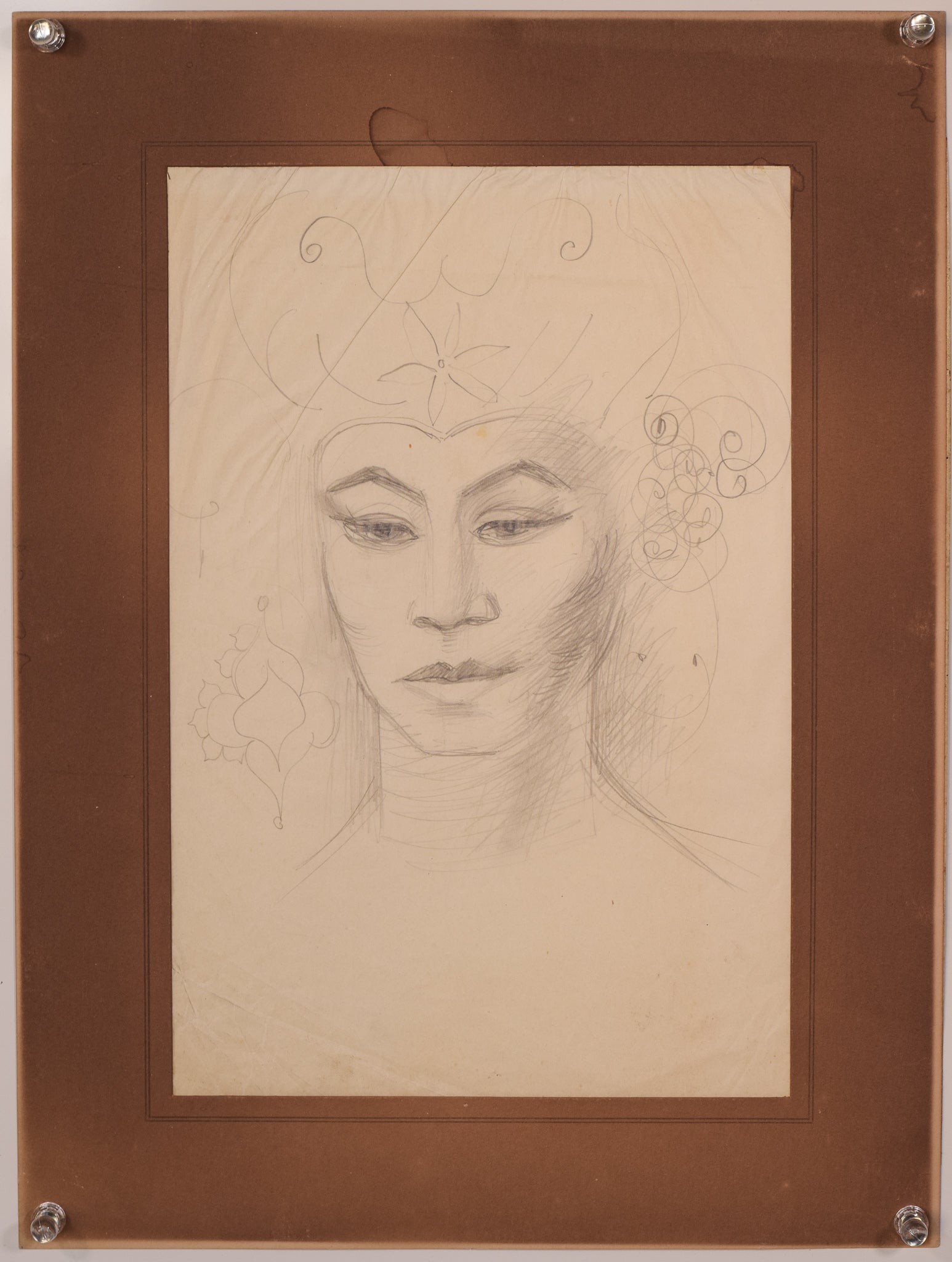 A drawing of a woman's face with a flower in her hair.