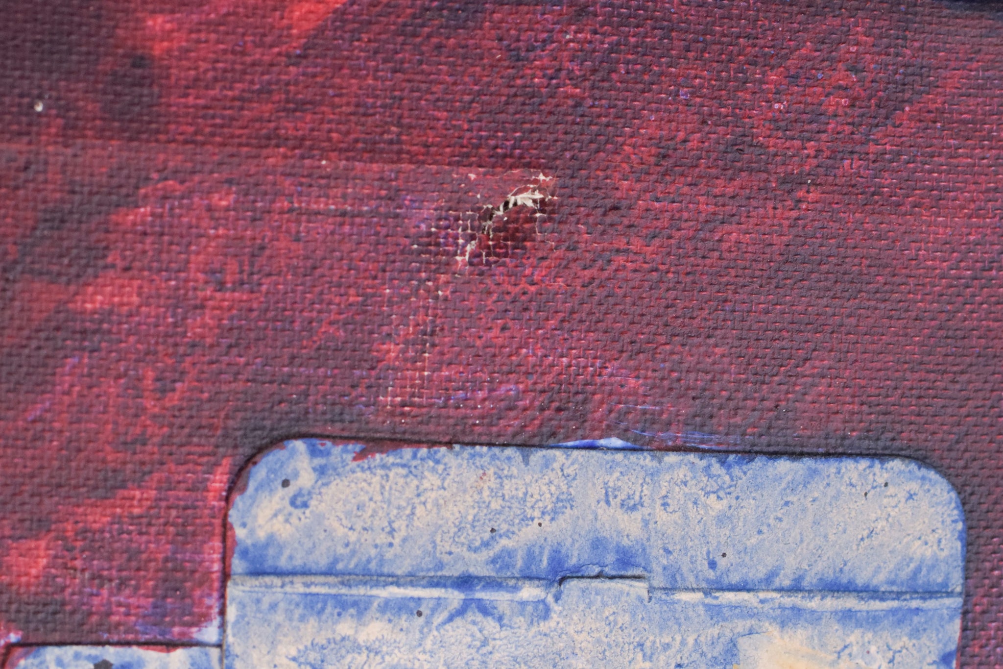 A painting of a piece of paper with a red and blue background.
