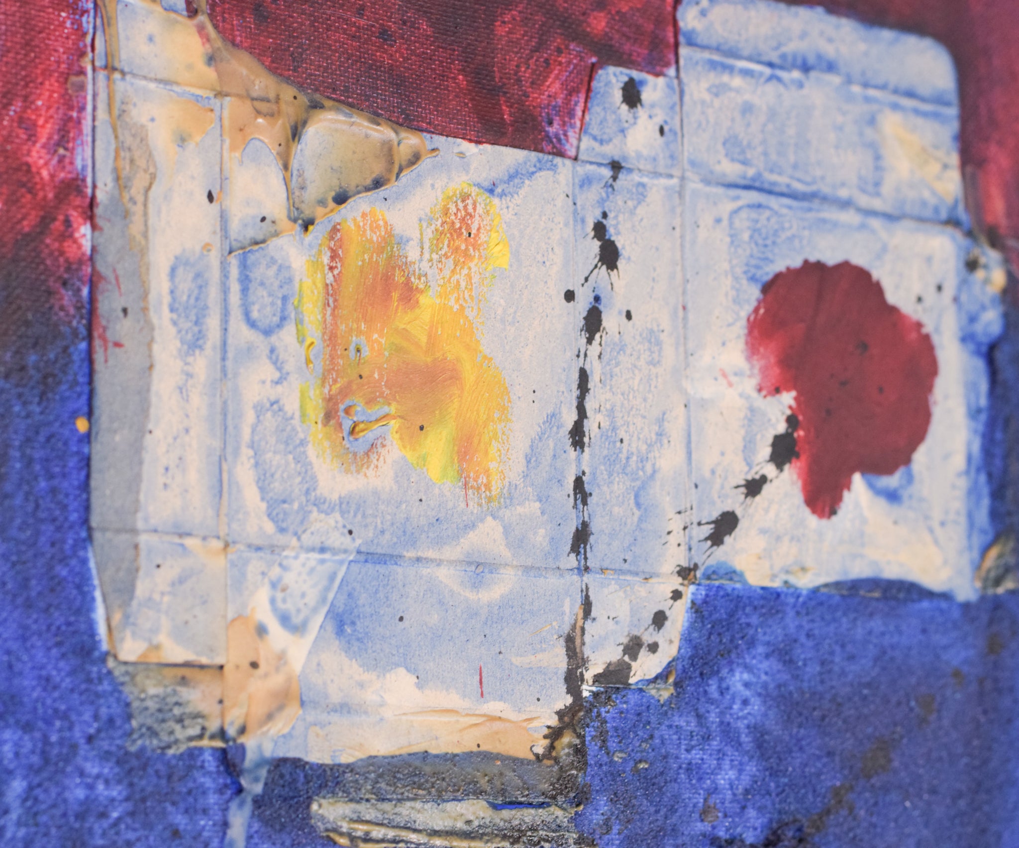 A painting of a piece of paper with a red and blue background.