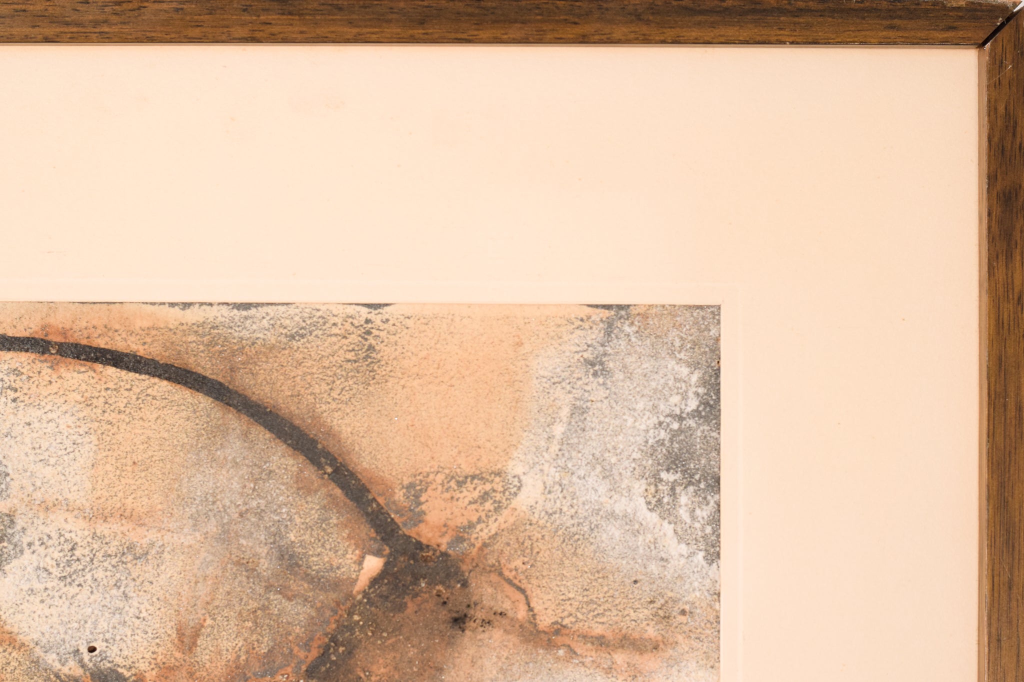 A close up of a piece of art on a wall.