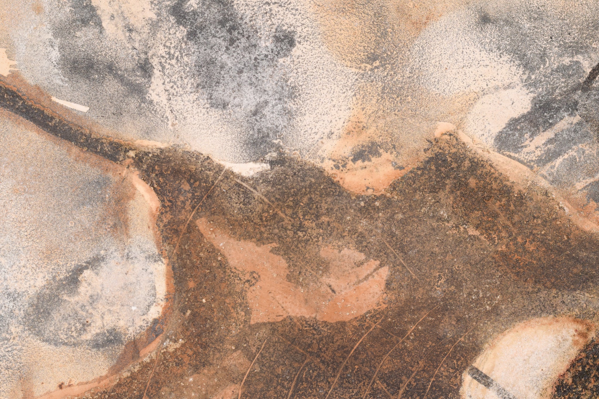 A close up of a piece of art on a wall.