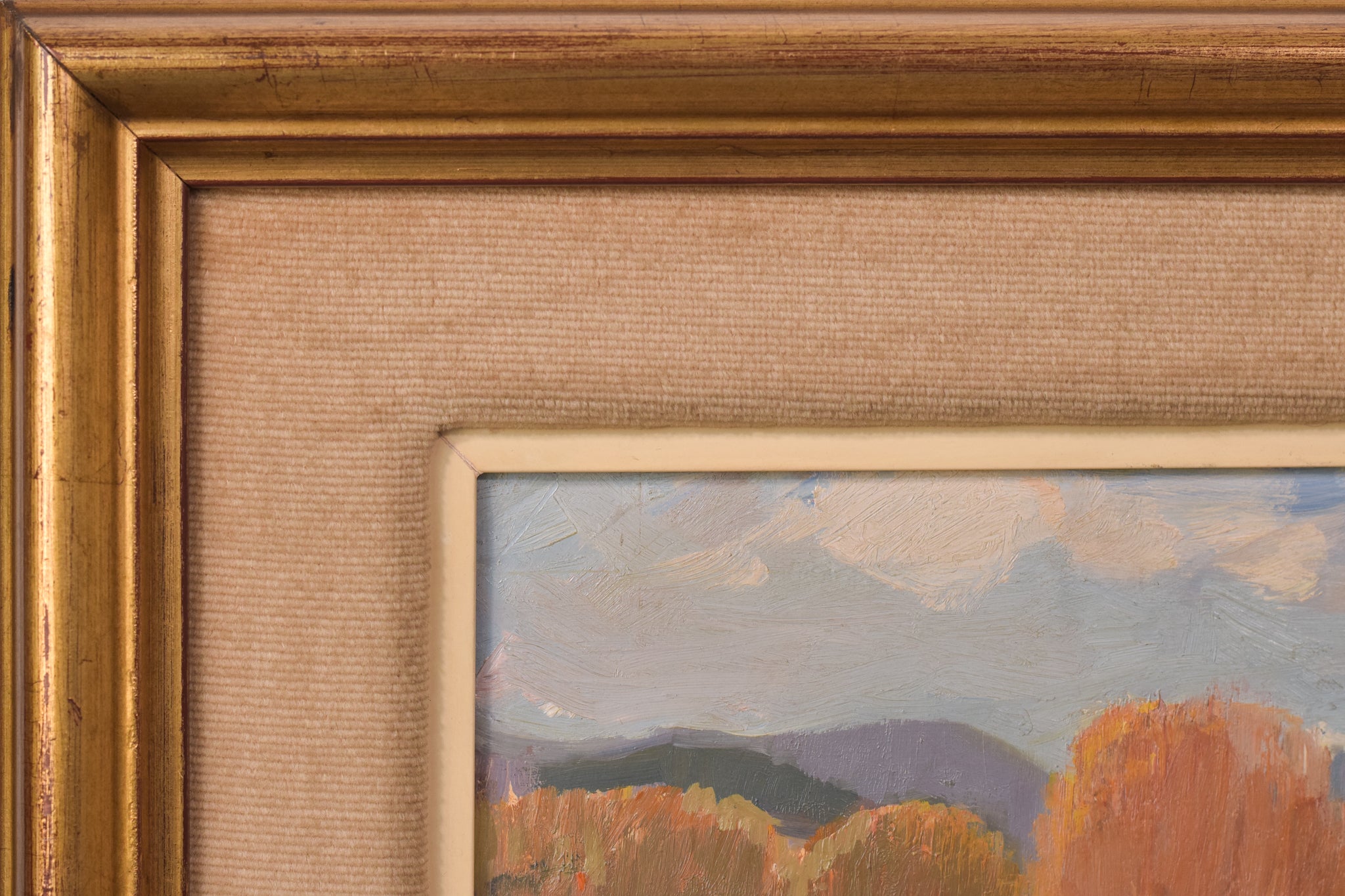 A painting of a landscape with a horse drawn carriage in the foreground.