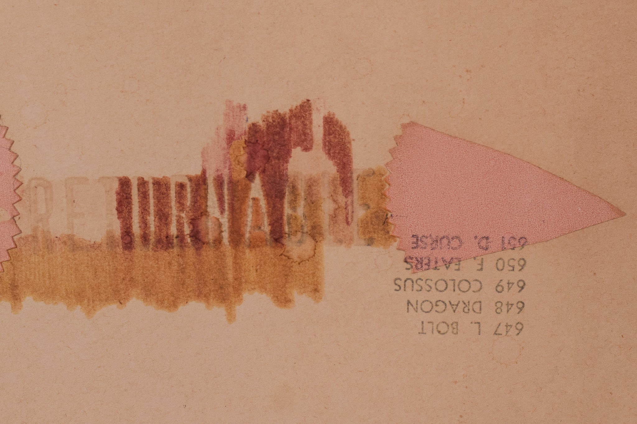 A piece of paper with a drawing of a city on it.