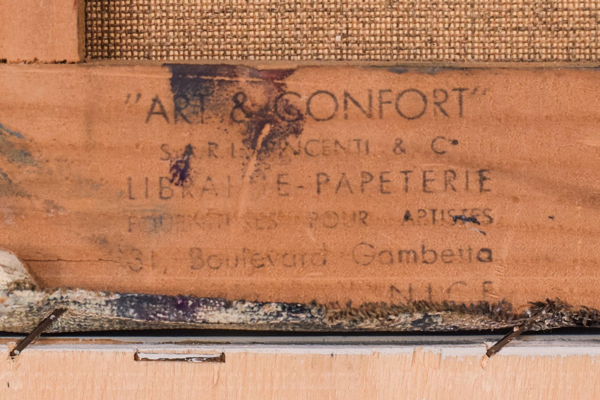 A painting of a woman sitting on a chair.