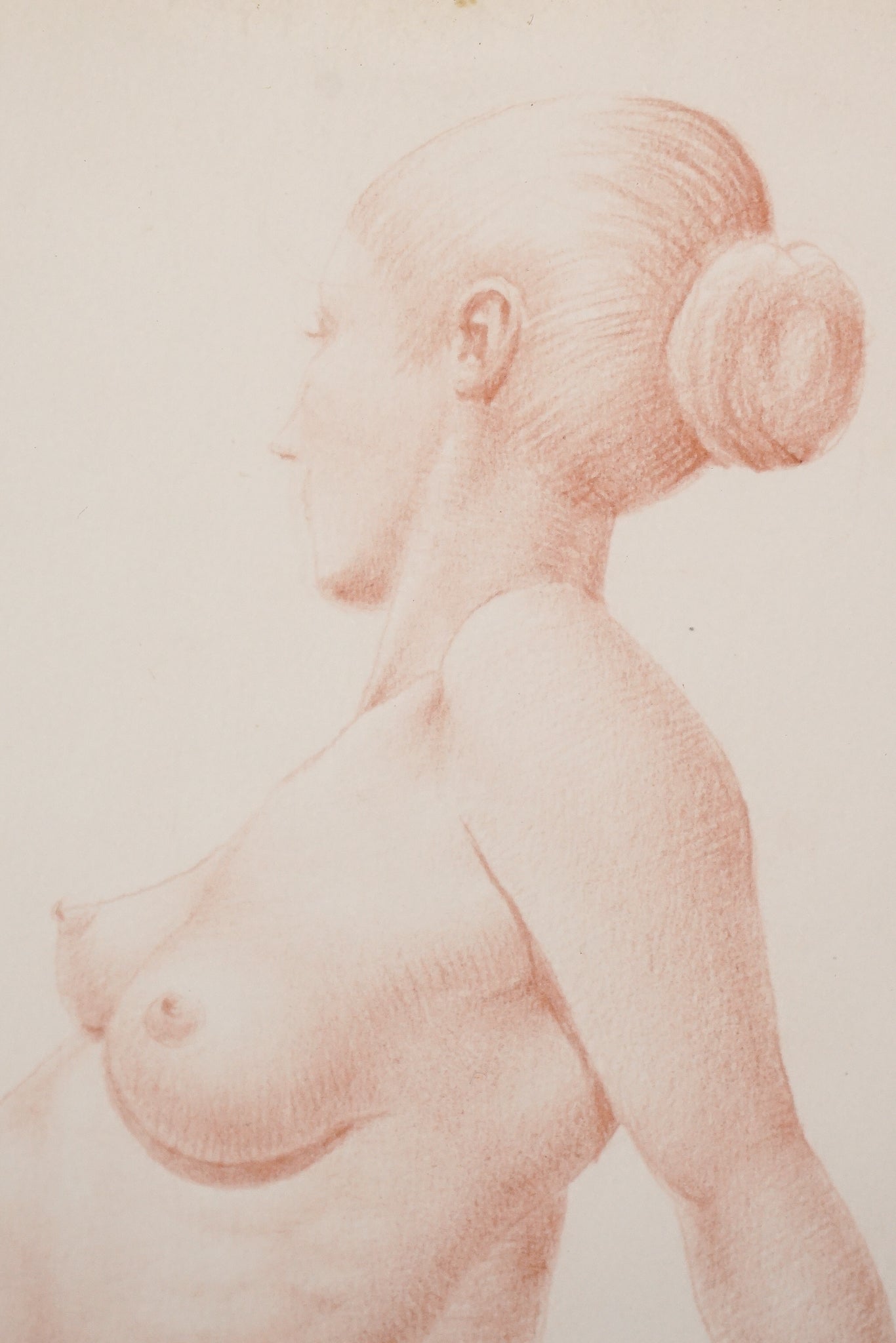 A drawing of a nude woman sitting on a chair.