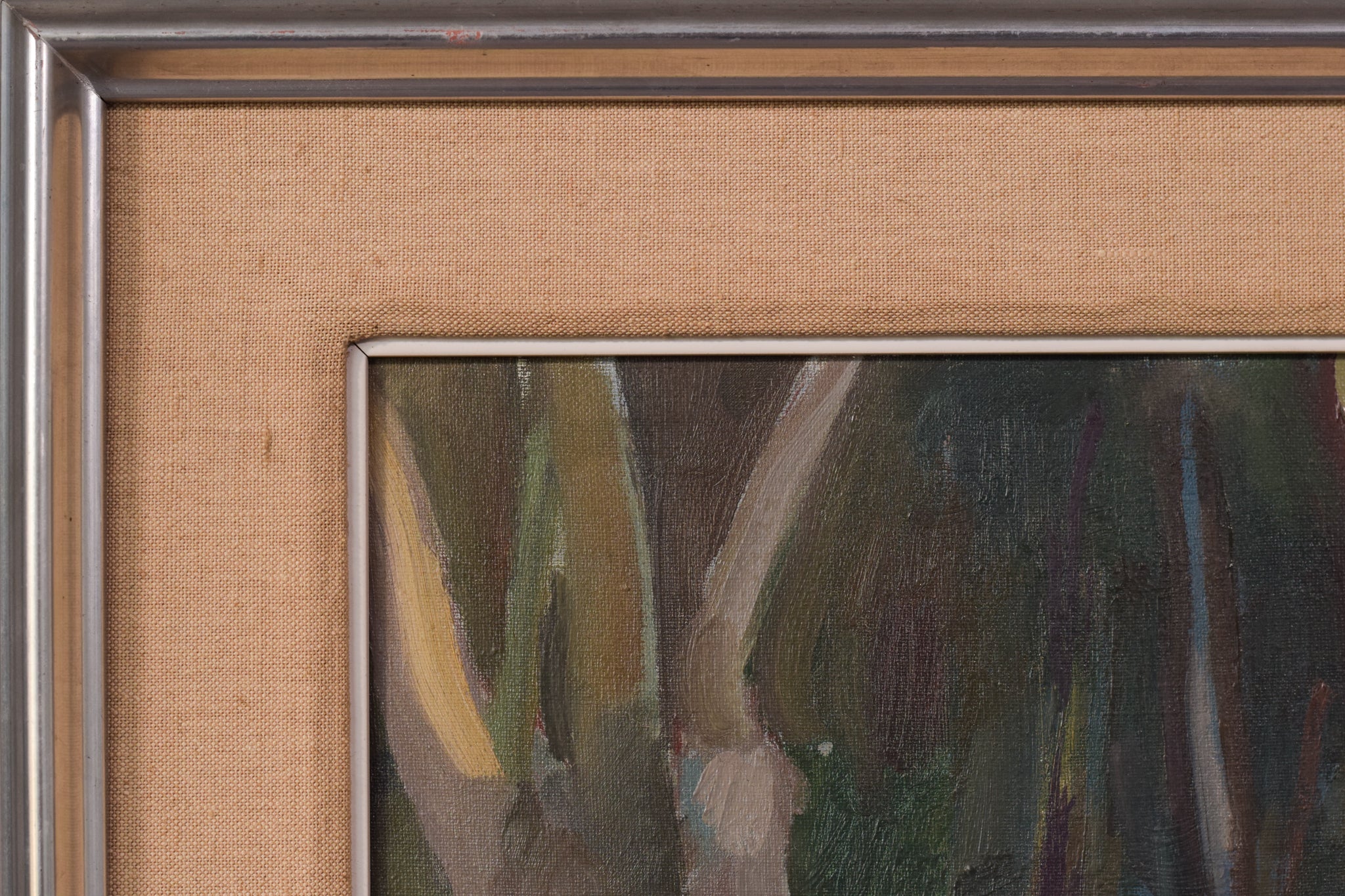 A painting of trees in a wooded area with a bench.