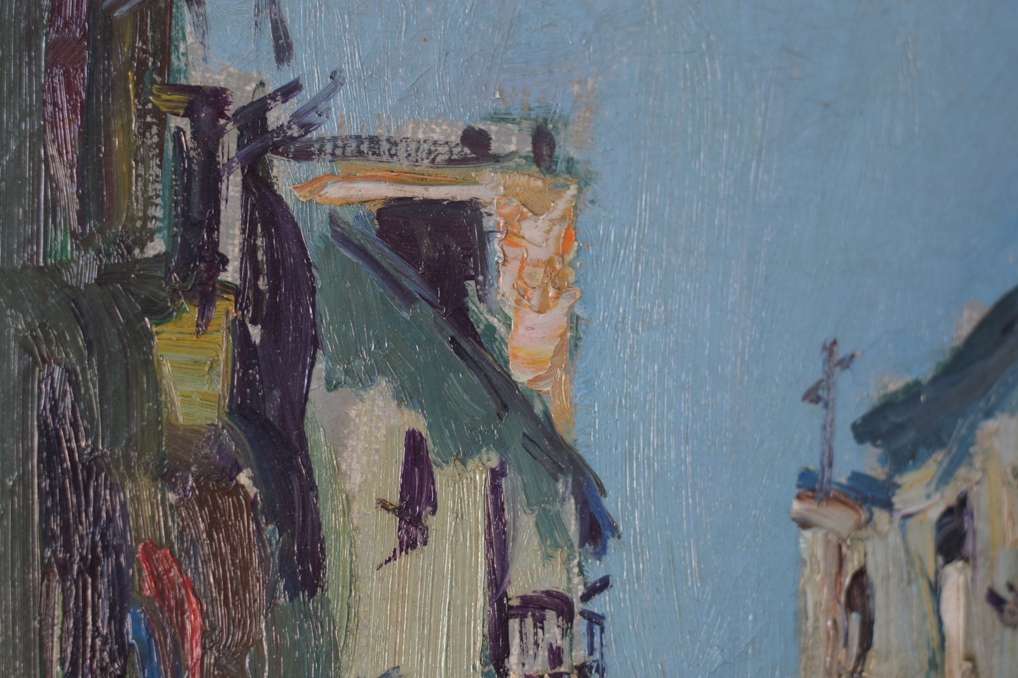 A painting of people walking down a narrow street.