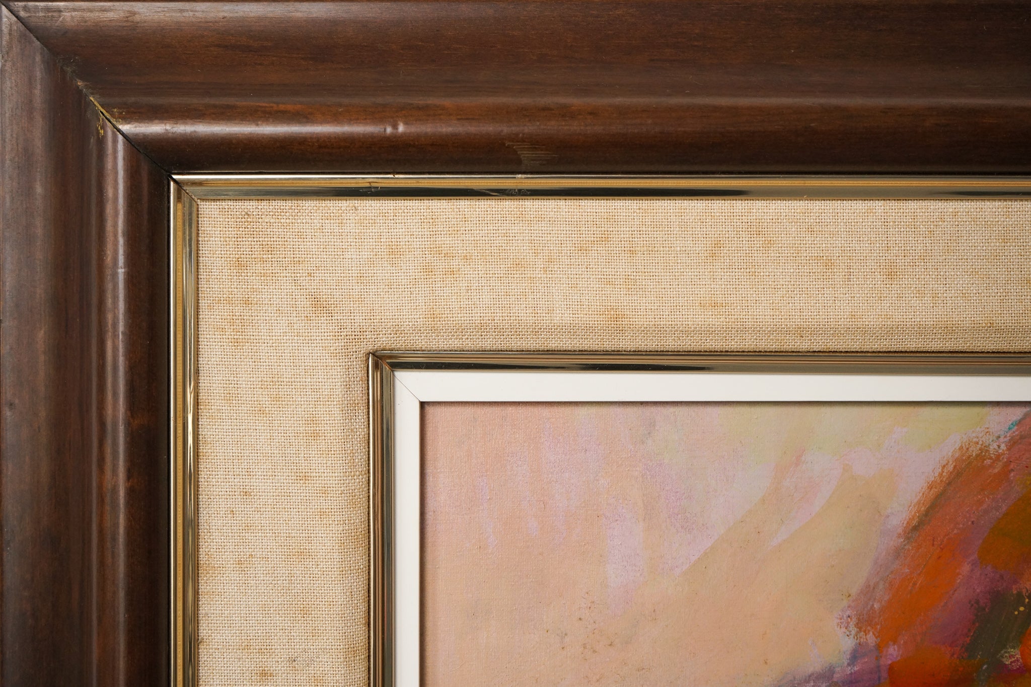 A painting of a woman wearing a yellow hat.