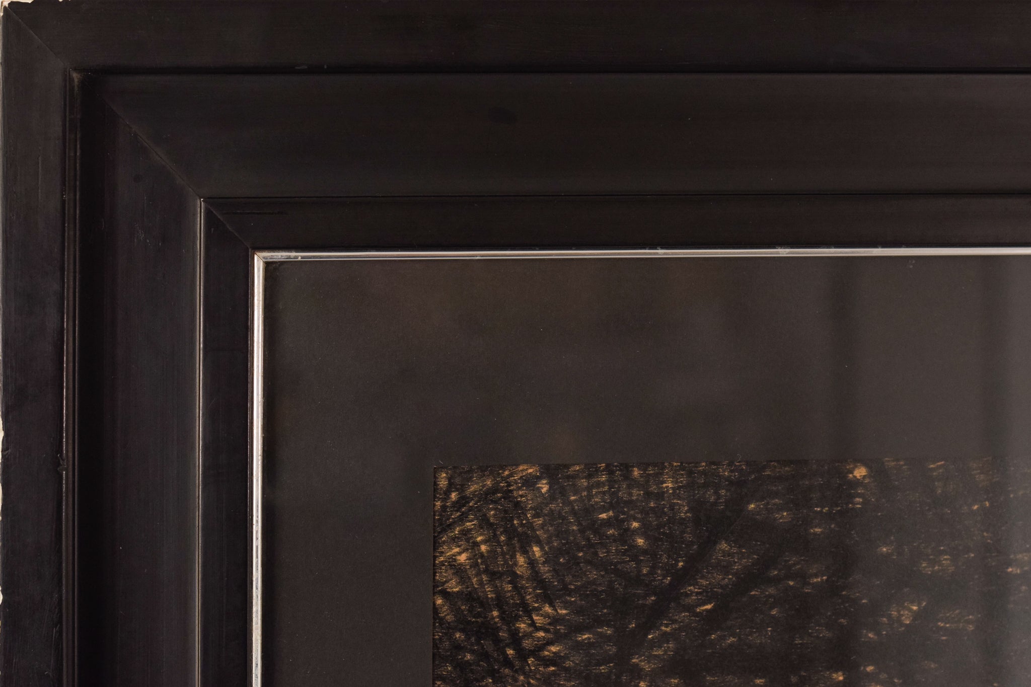 A drawing of a nude woman sitting on a chair.