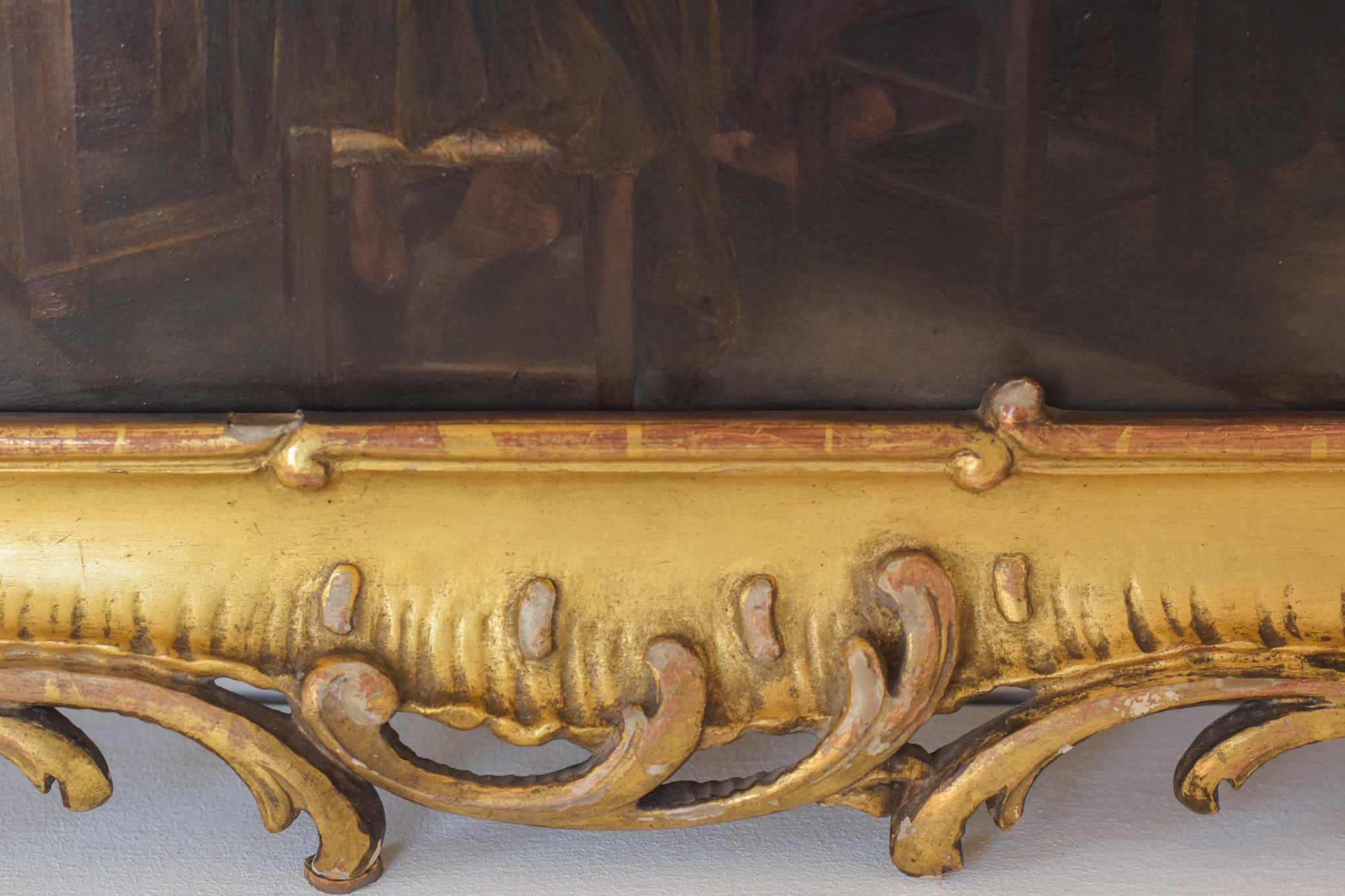 A painting of a group of people sitting around a table.