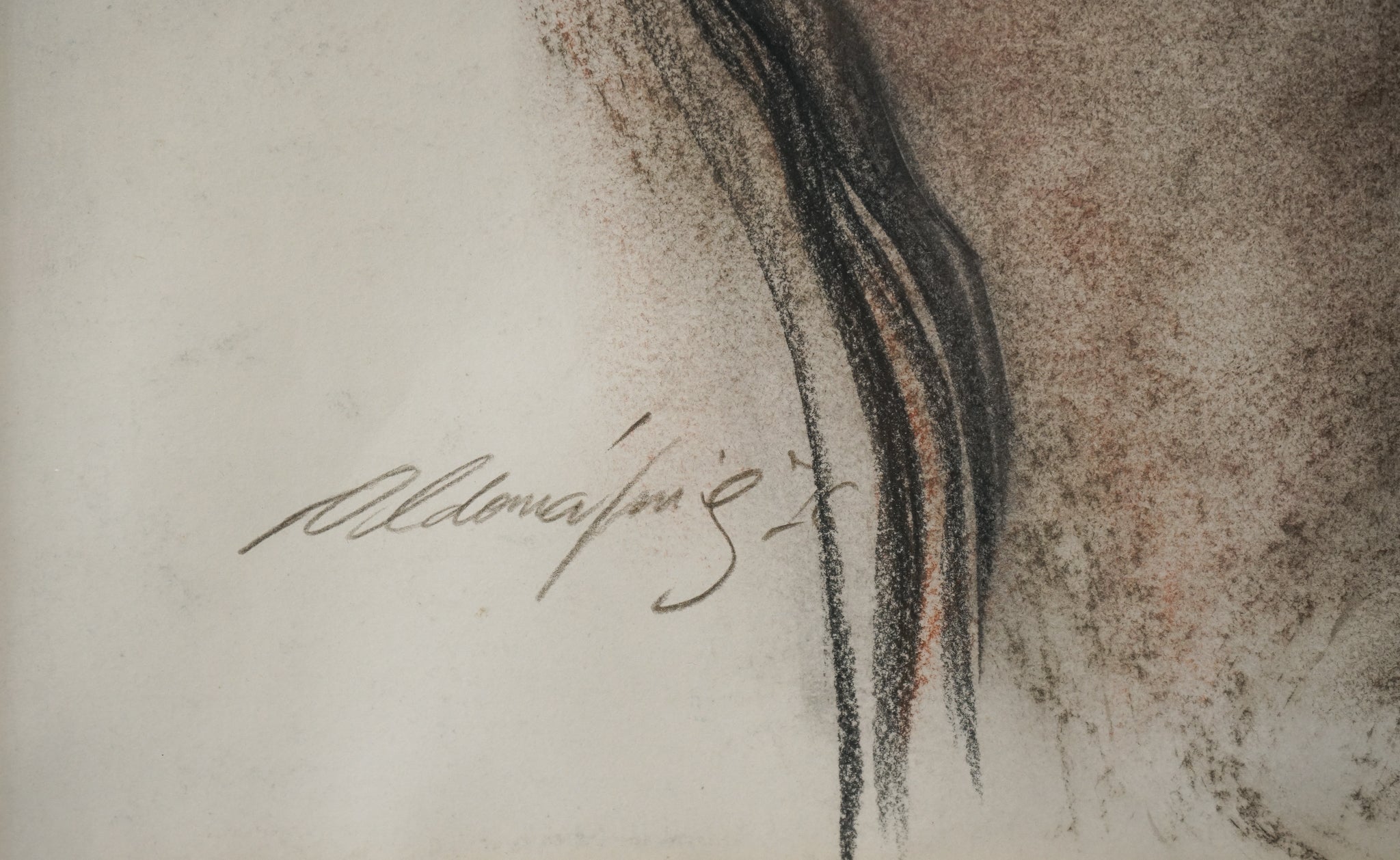 A drawing of a nude female standing in front of a wall.