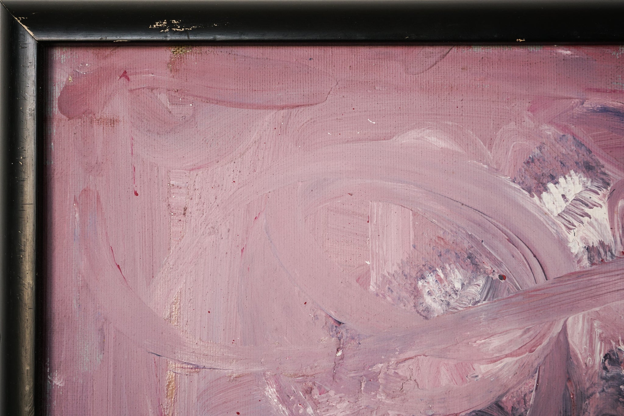A painting with pink, black, and white paint on it.