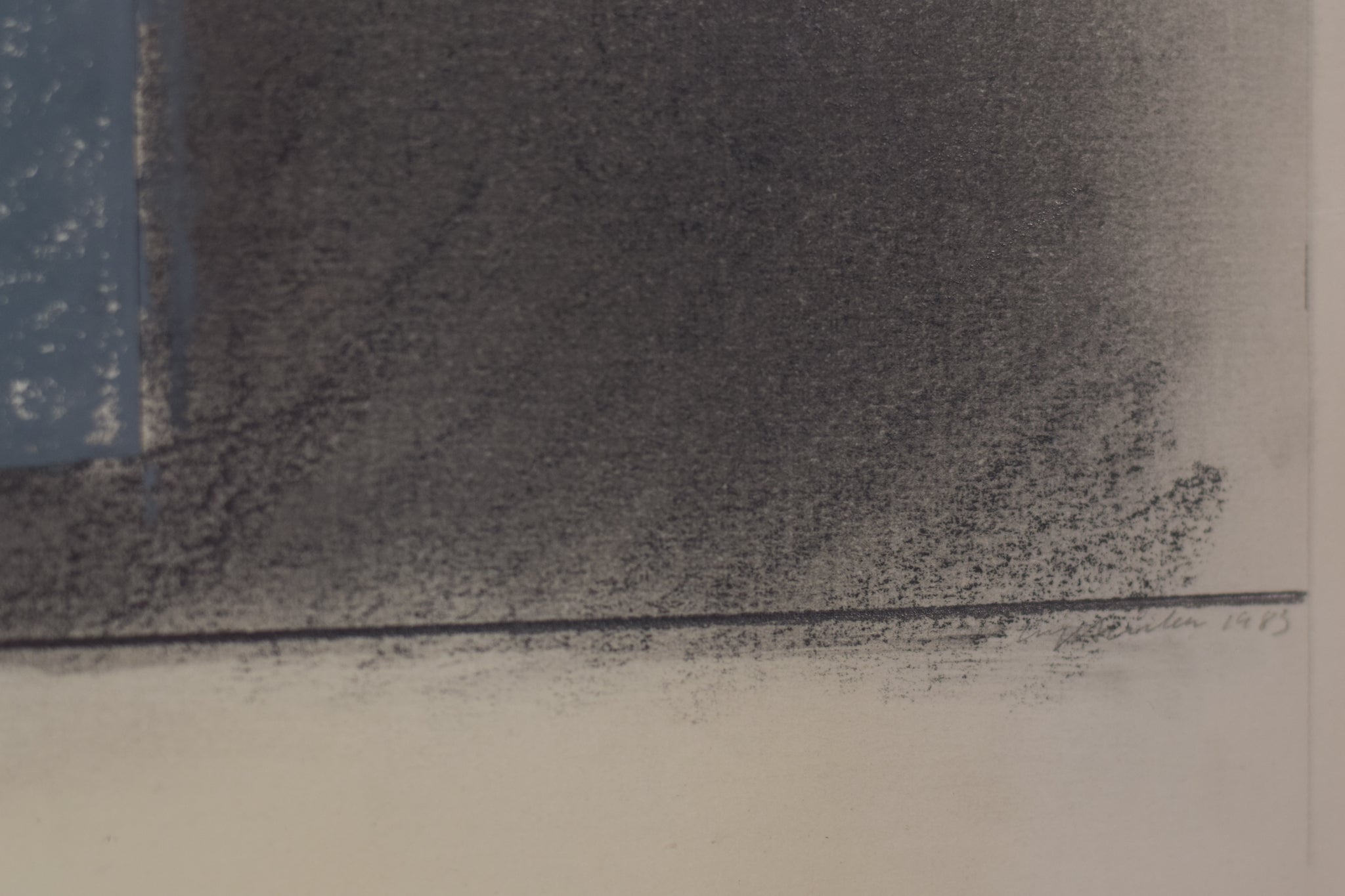 A black and white drawing of a blue square on a gray background.