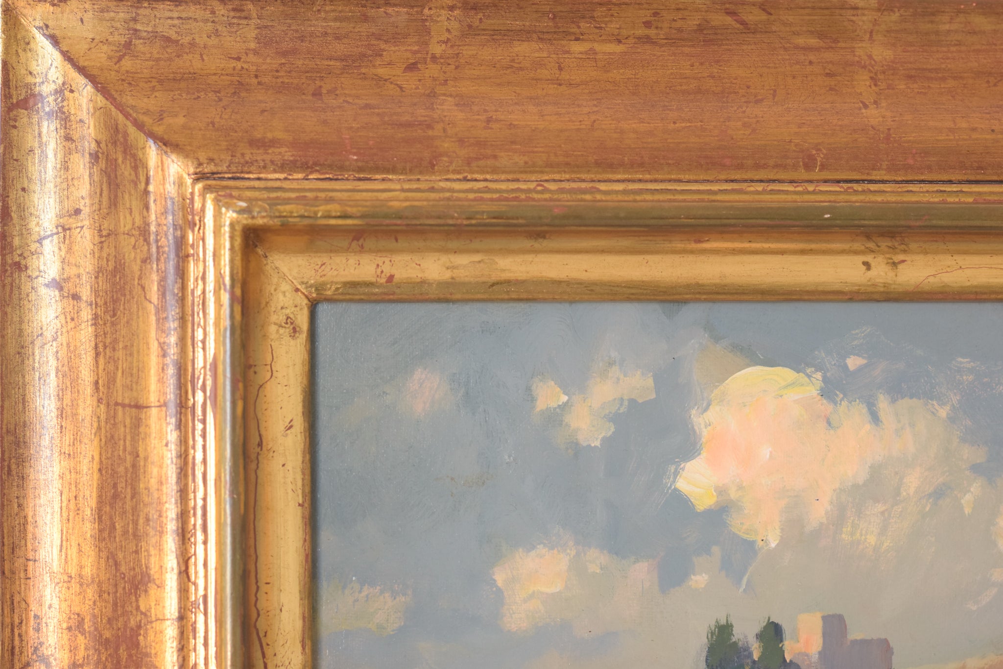 A painting of a mountain landscape with clouds in the sky.