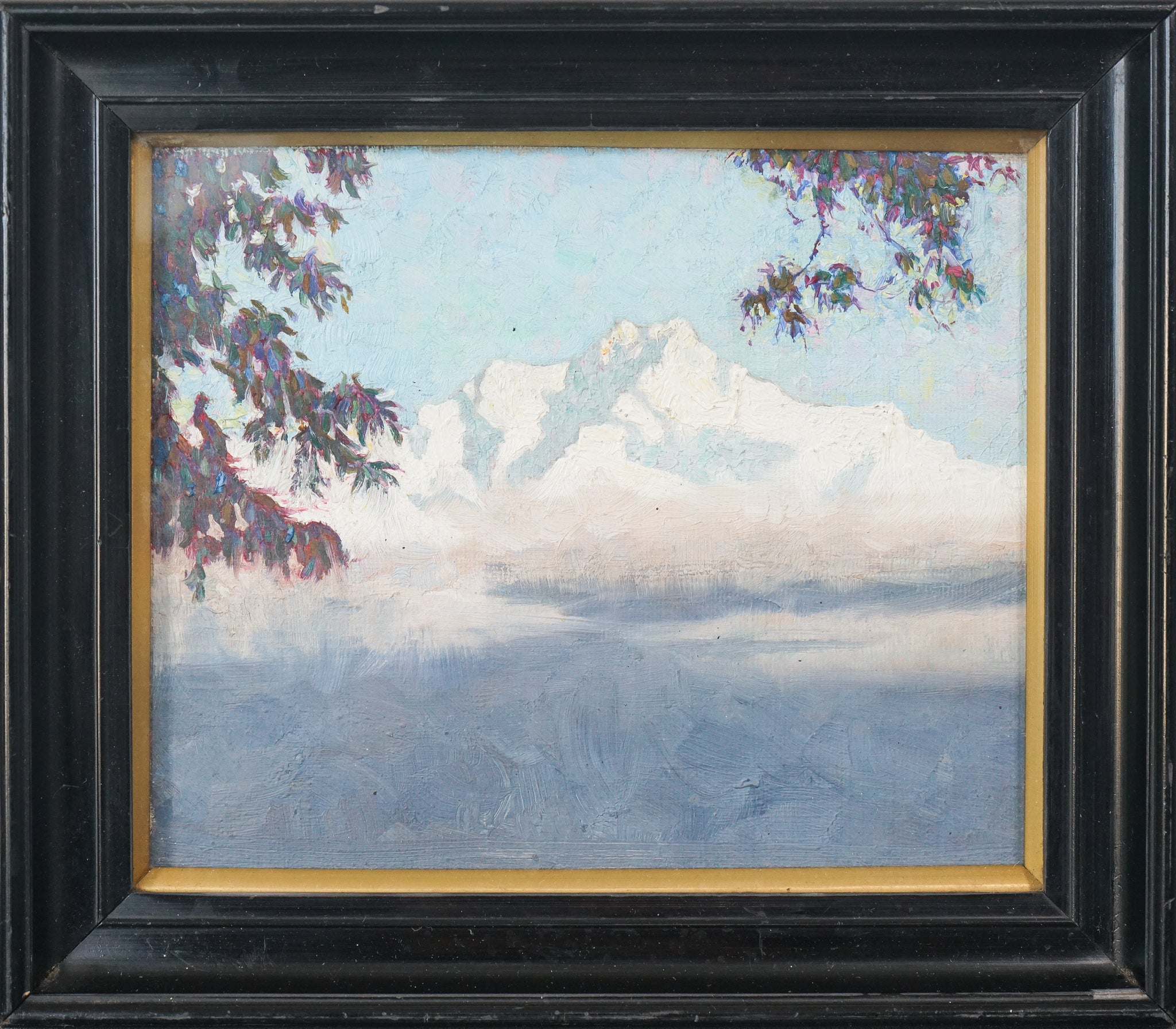 A painting of a mountain and a painting of the same mountain.