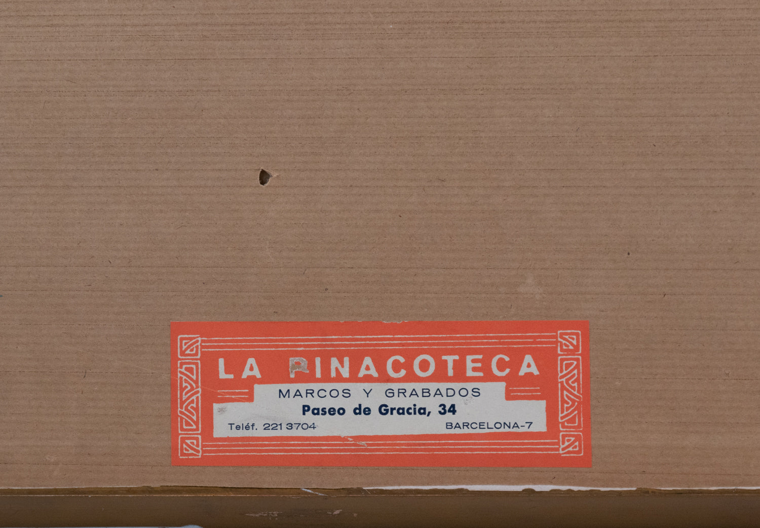 A watercolor painting of a rocky landscape with trees on a hillside.