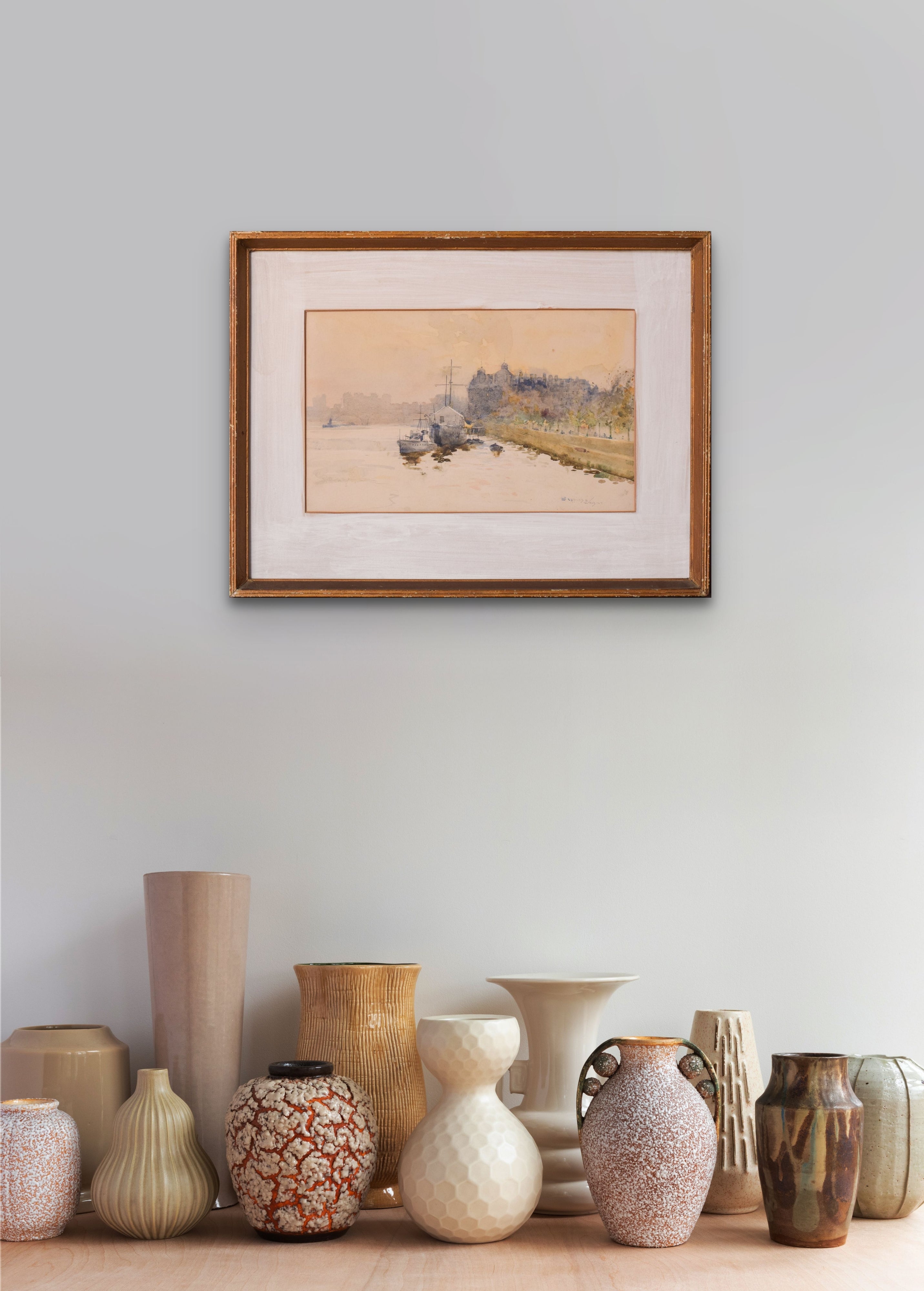 A watercolor painting of boats on a river with a castle in the background.