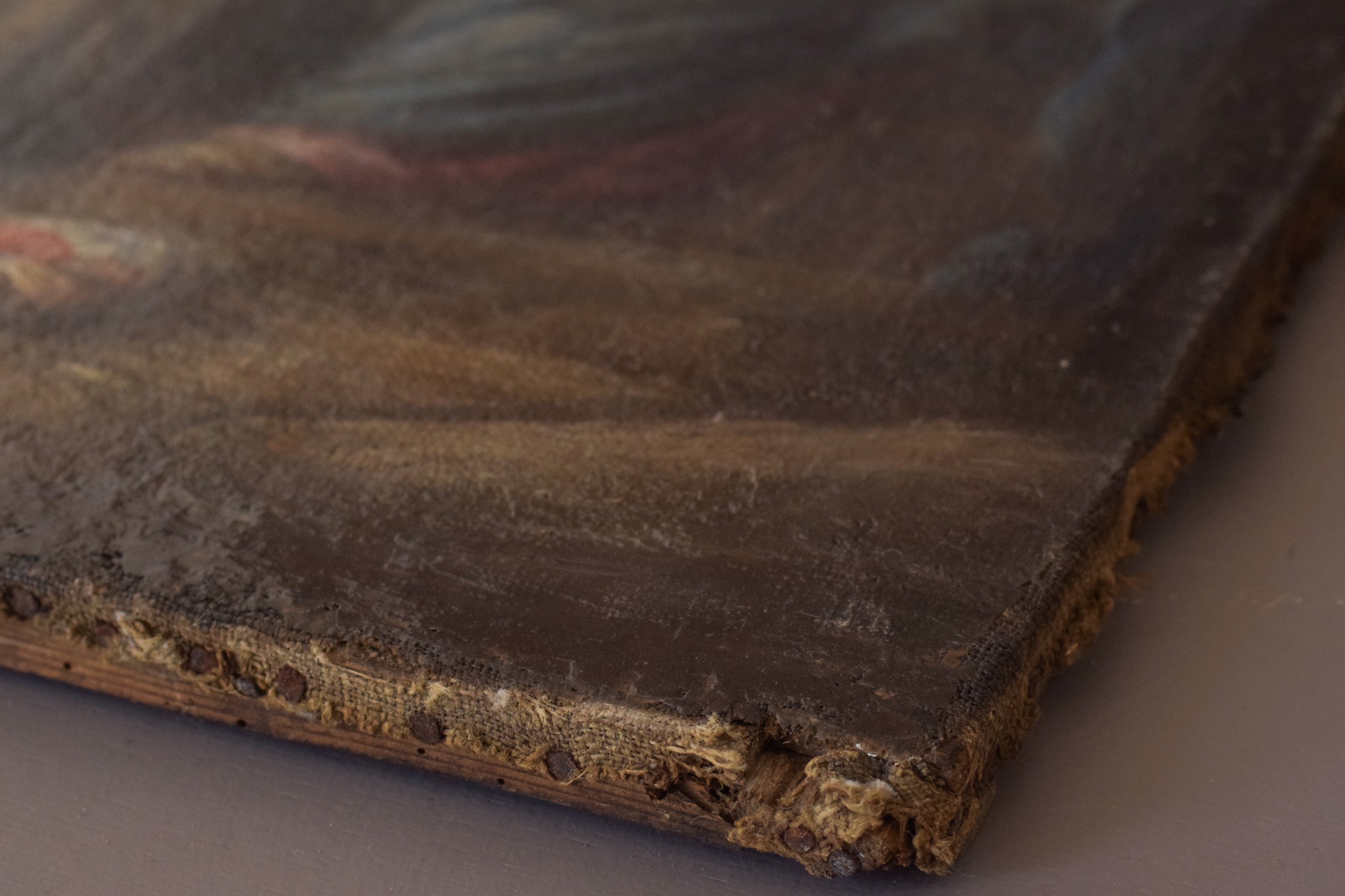 A painting of a nativity scene with the birth of Jesus.