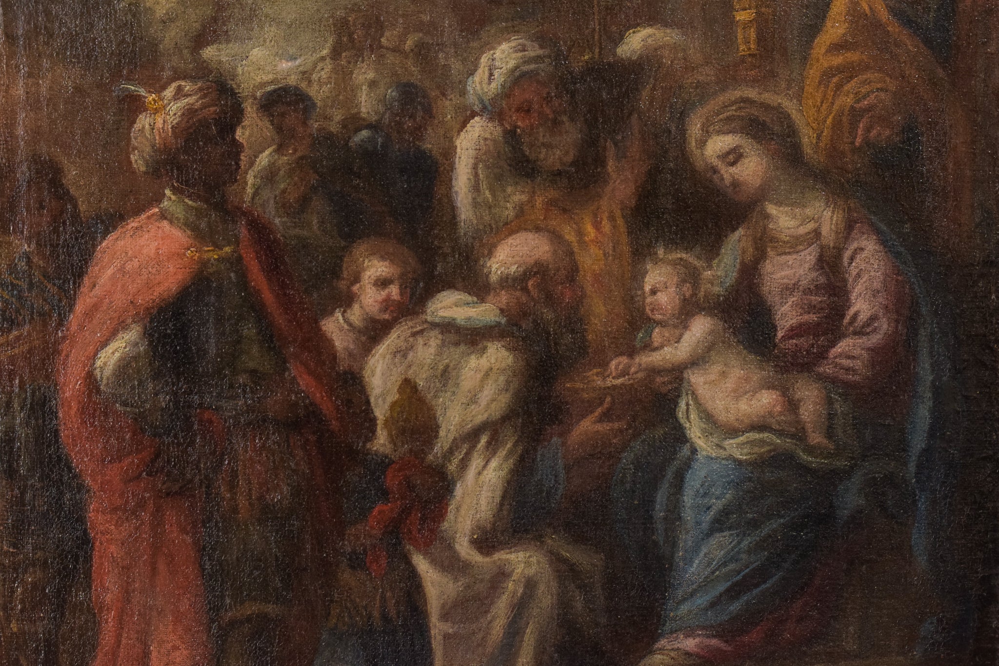 A painting of a nativity scene with the birth of Jesus.