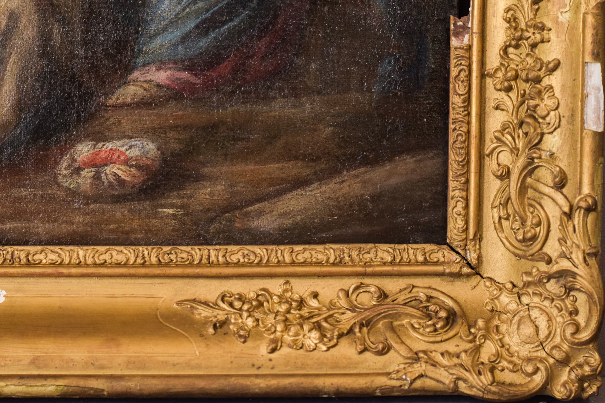 A painting of a nativity scene with the birth of Jesus.