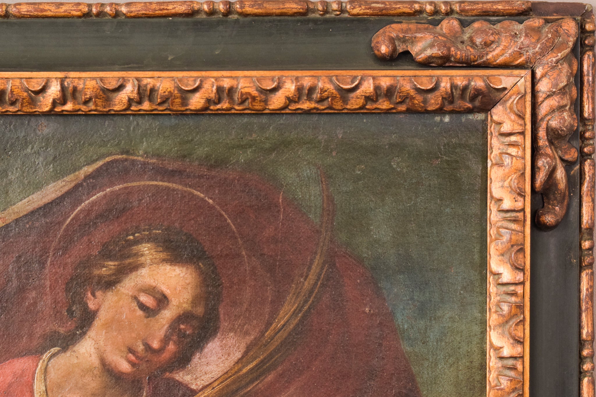 A painting of a woman holding a scythe and a dragon.