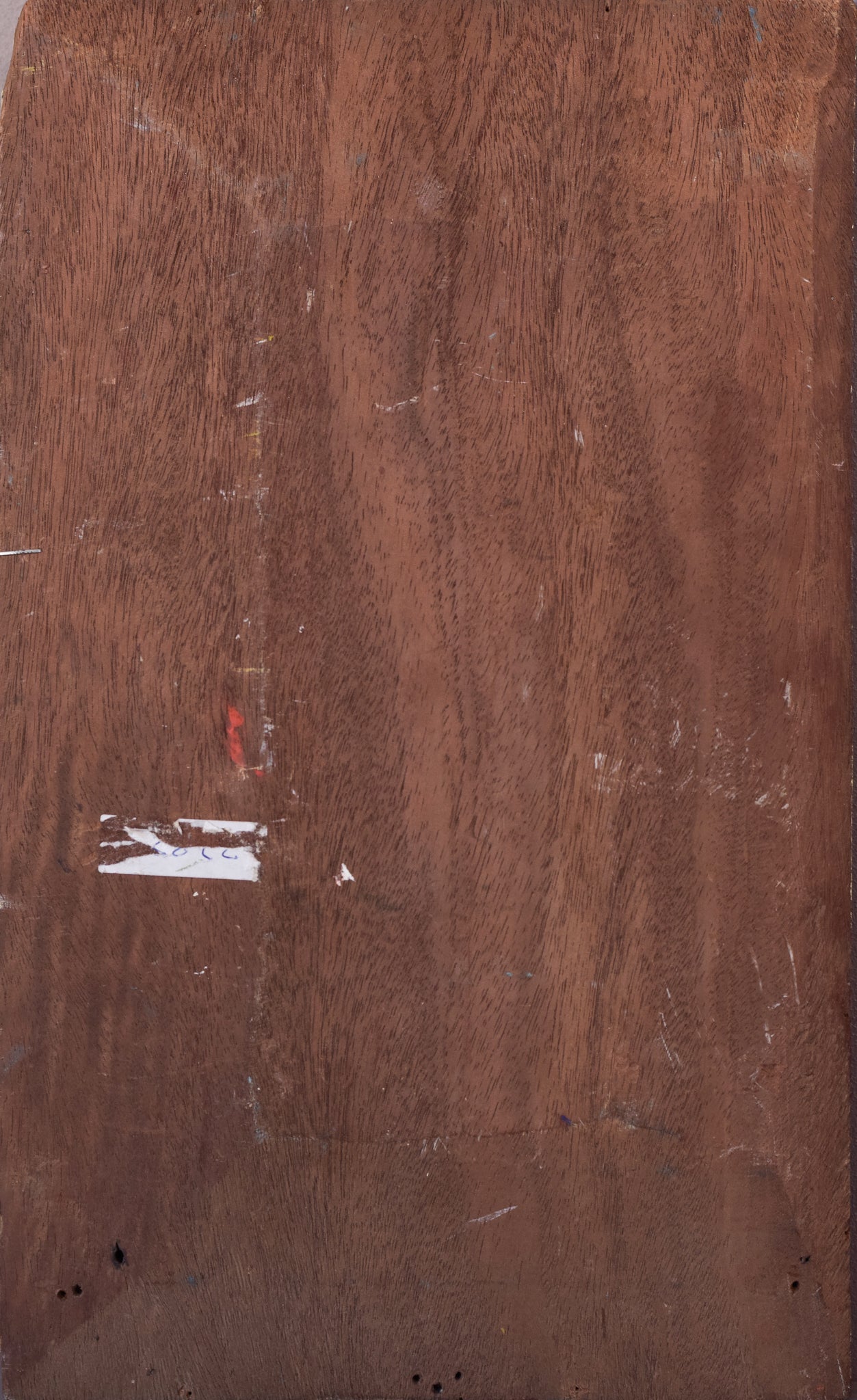 Two paintings of a bullfight and a painting of a man riding a horse.