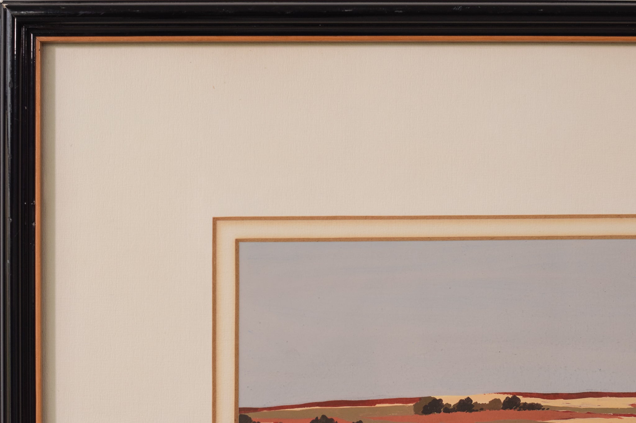 Two paintings of a landscape with a large rock in the middle of it.